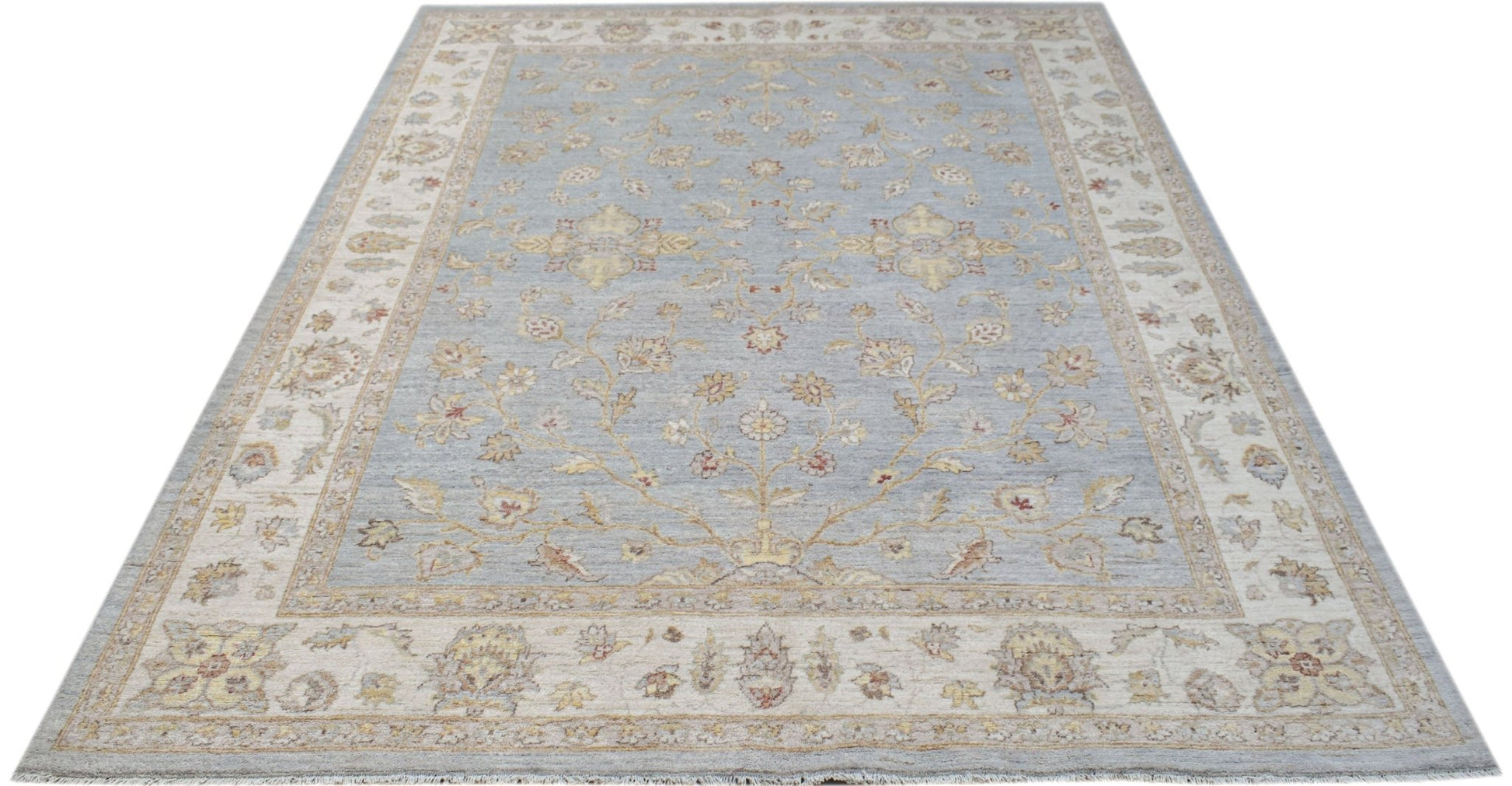 A handmade Afghan Chobi rug featuring a traditional floral pattern in soft blue and beige tones.