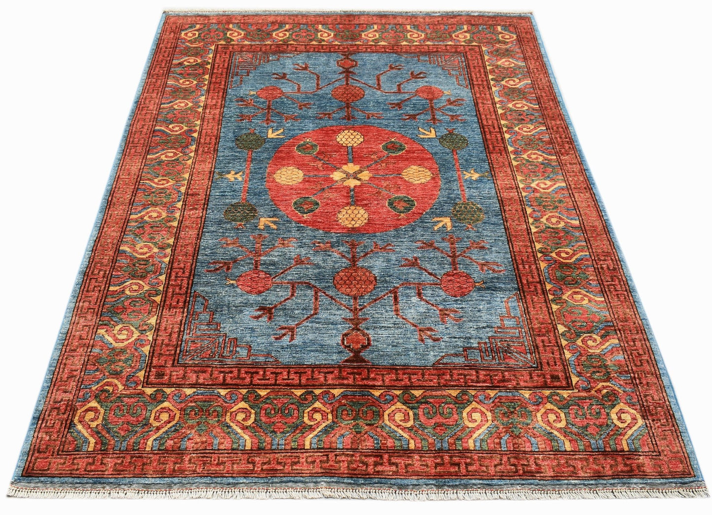 A rectangular Afghan Chobi rug featuring a blue field with a central red medallion and floral motifs.