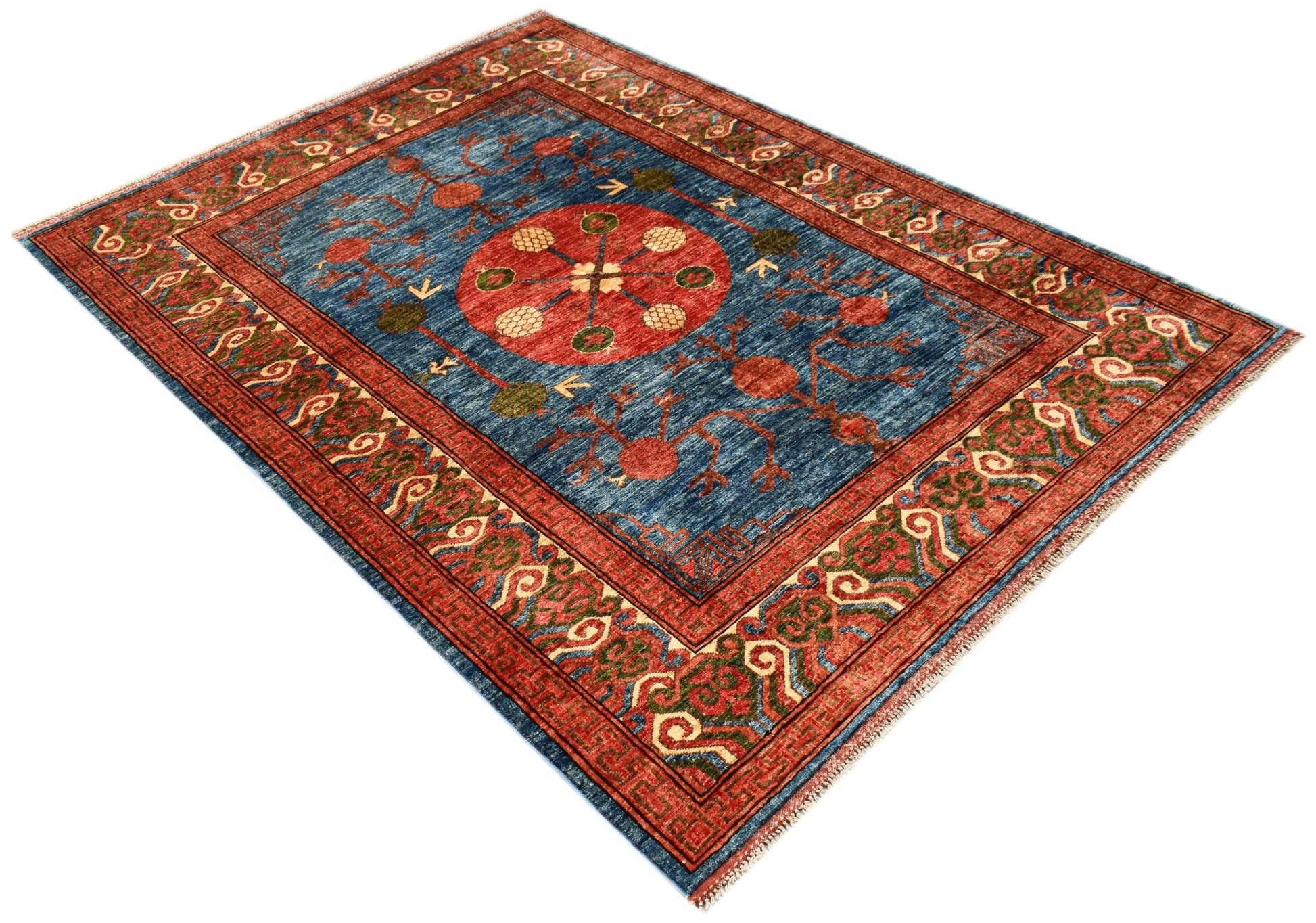 A rectangular Afghan Chobi rug featuring a central red medallion on a blue field with floral motifs.