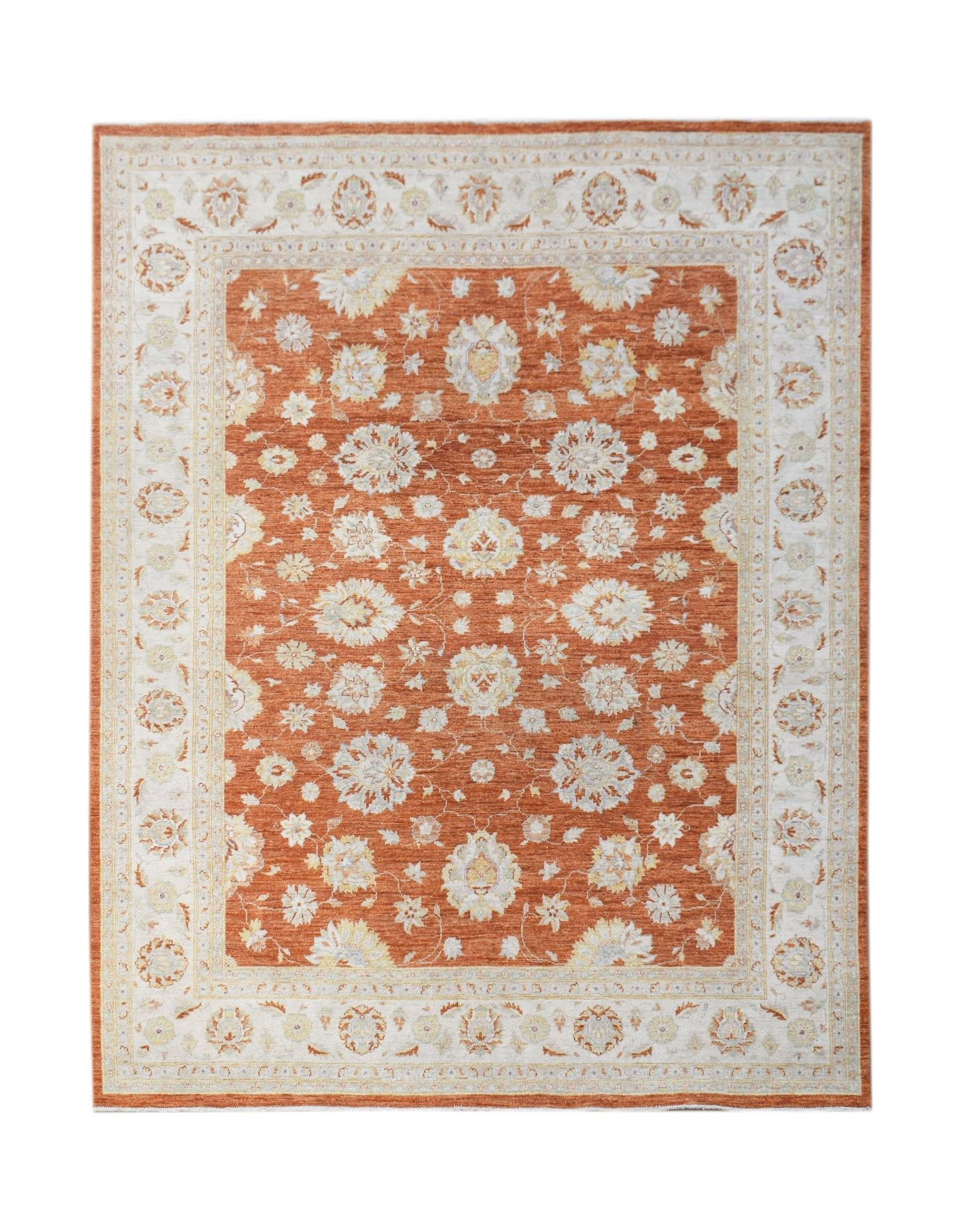 A handmade Afghan Chobi rug featuring a floral pattern in shades of orange, cream, and beige.
