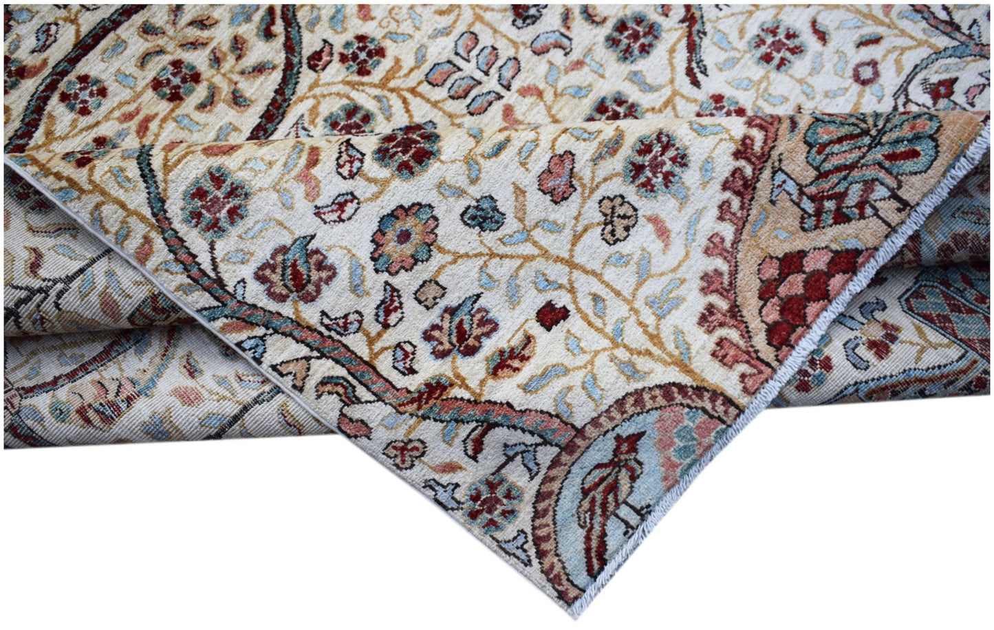 A handwoven Afghan Chobi rug featuring a traditional floral pattern in soft, earthy tones.