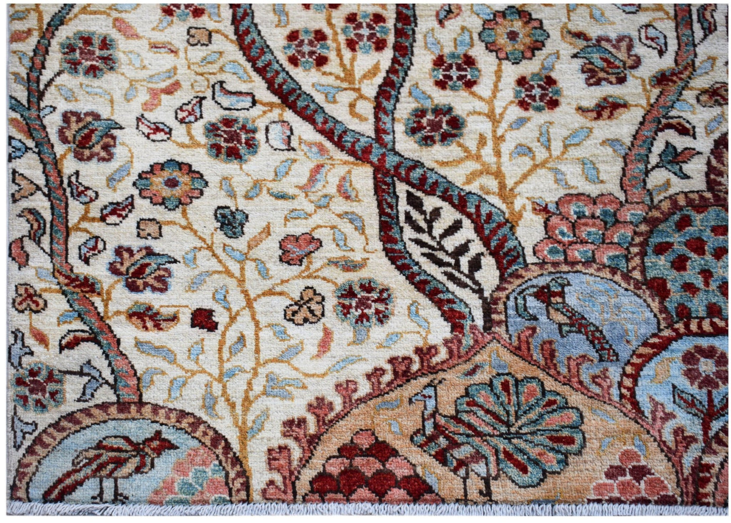 A handwoven Afghan Chobi rug featuring intricate floral patterns and birds in earthy tones.