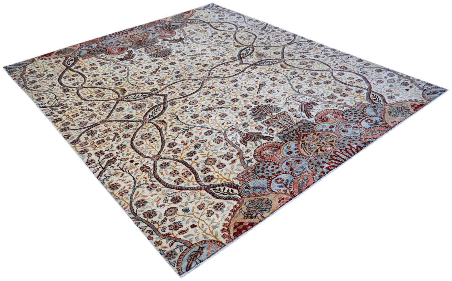 An Afghan Chobi rug featuring a traditional floral vine pattern in muted earth tones.
