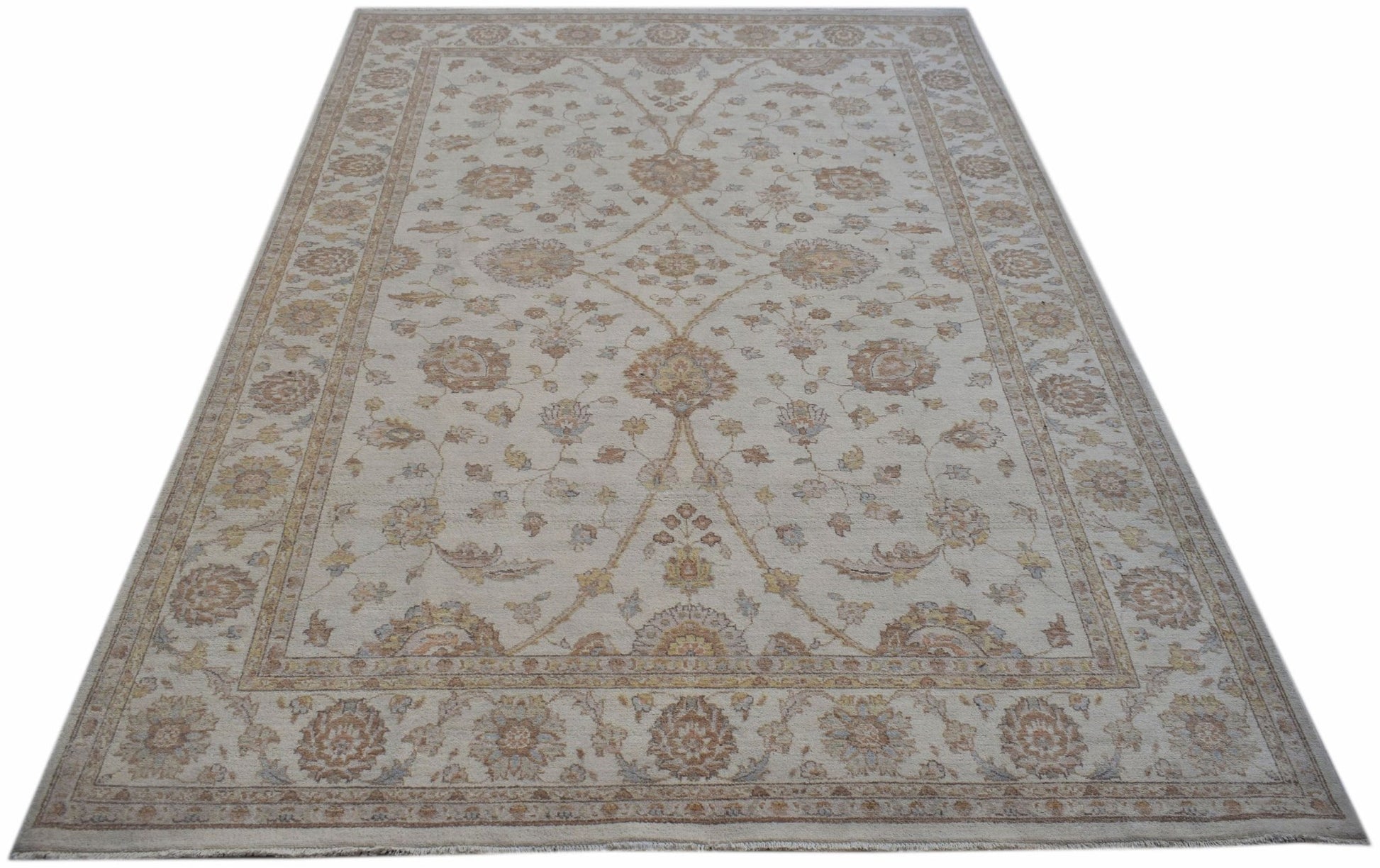 An Afghan Chobi rug featuring a traditional floral pattern in soft, earthy wood tones.