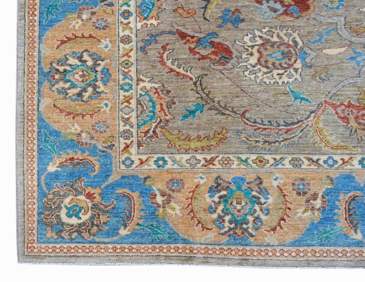 A handwoven Afghan Chobi rug featuring intricate floral patterns in blue, tan, and grey tones.