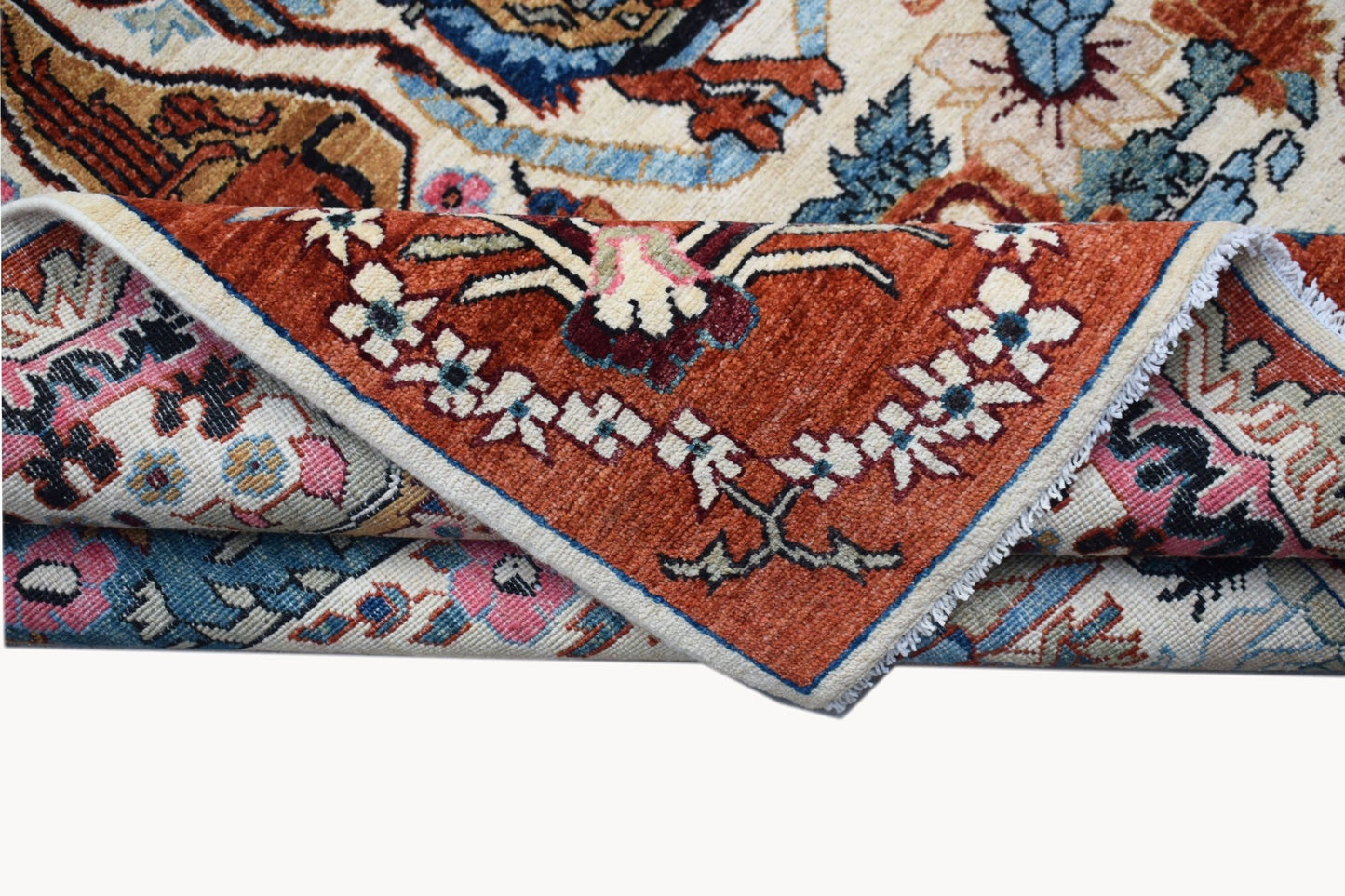 A handwoven Afghan Chobi rug featuring a detailed hunting scene in warm, earthy tones.