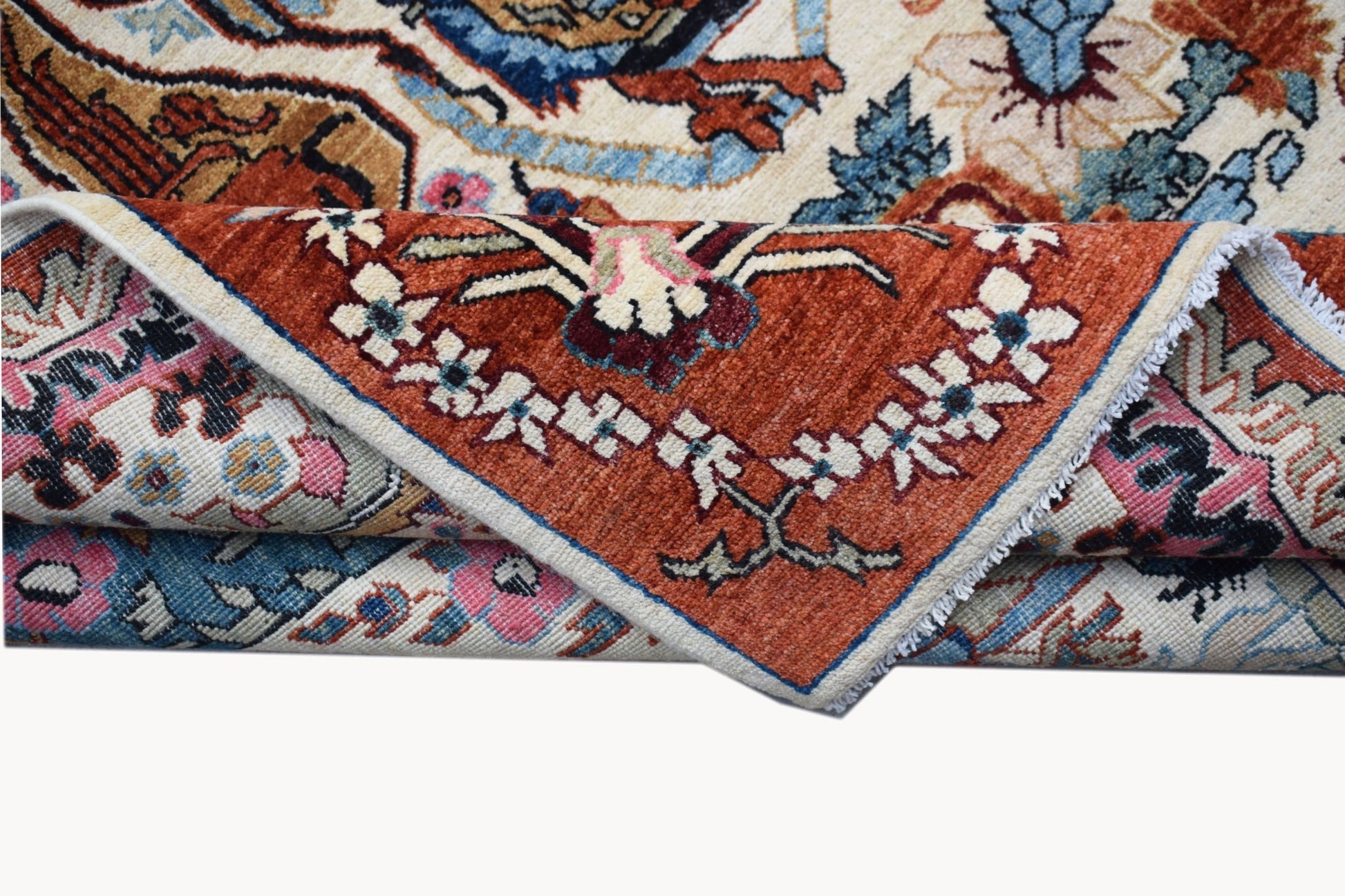 A handwoven Afghan Chobi rug featuring a detailed hunting scene in warm, earthy tones.