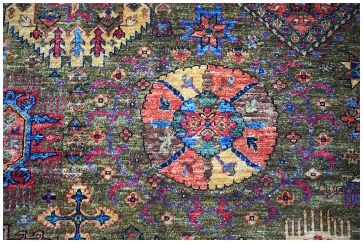 An Afghan Chobi rug featuring a traditional floral medallion pattern in earthy tones.