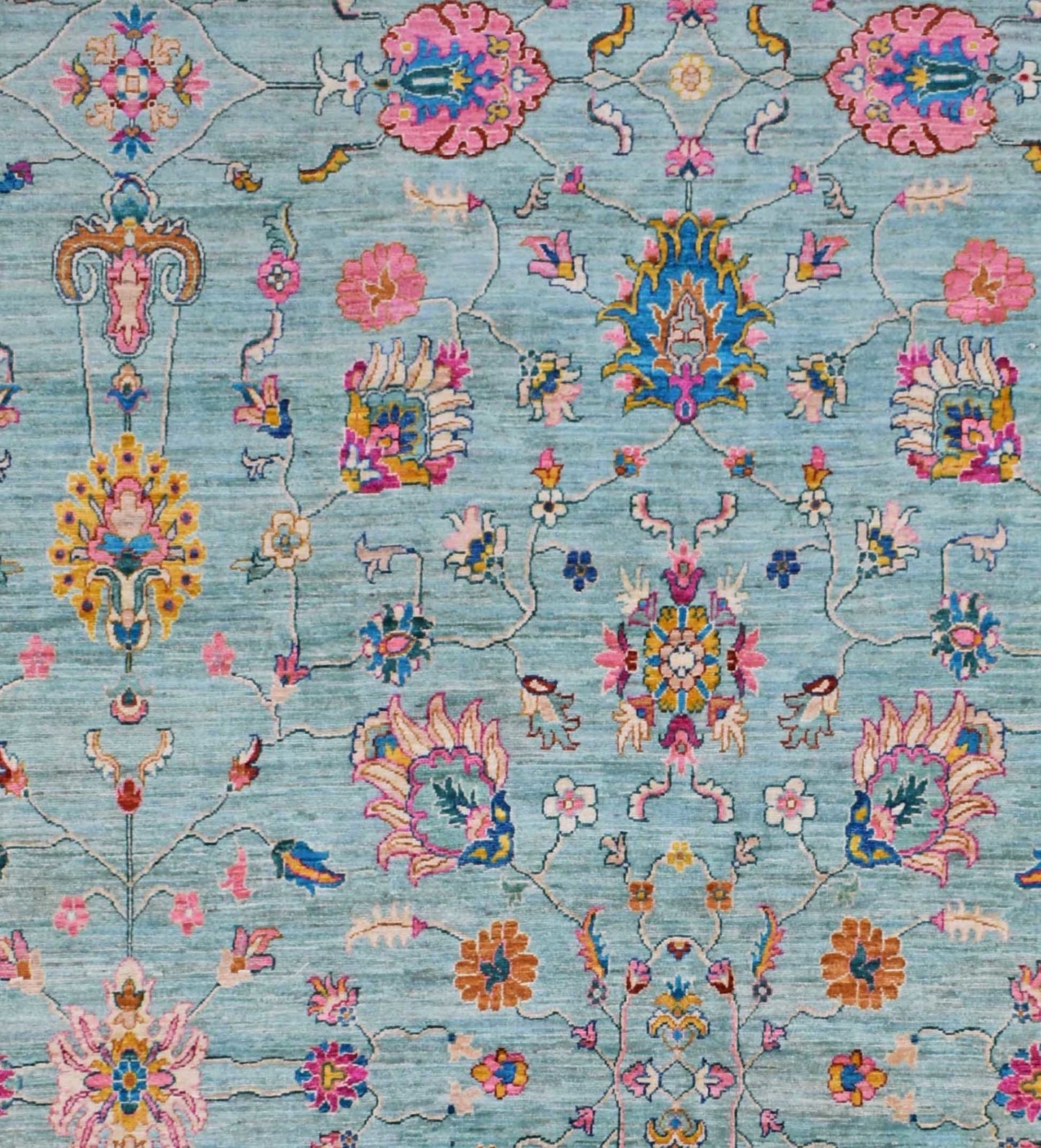 An Afghan Chobi rug featuring a traditional floral pattern in shades of blue, pink, and gold.