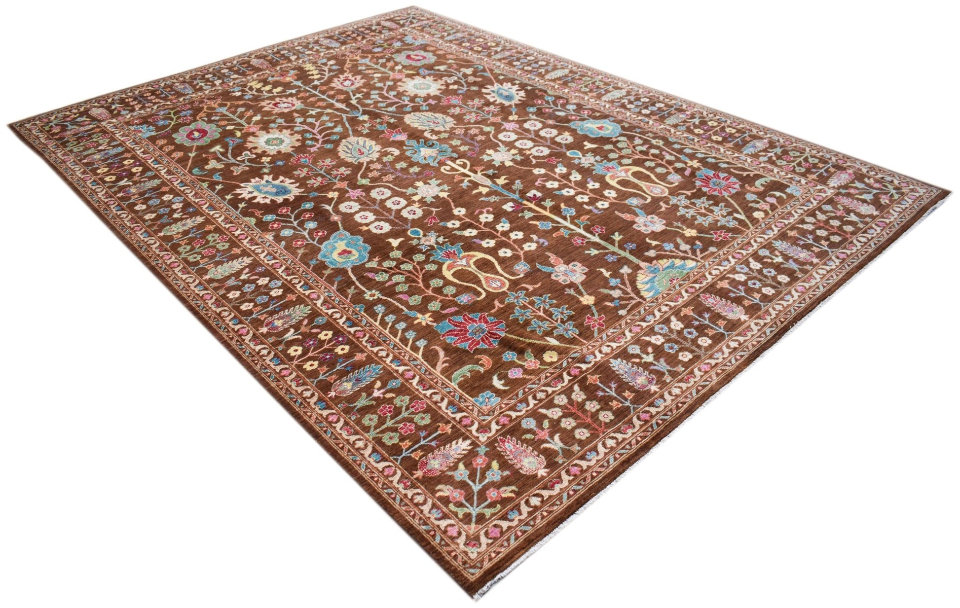 A rectangular Afghan Chobi rug featuring a traditional floral pattern in earthy tones.