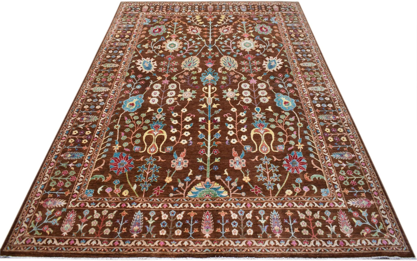 A rectangular Afghan Chobi rug featuring a traditional floral pattern in earthy tones.