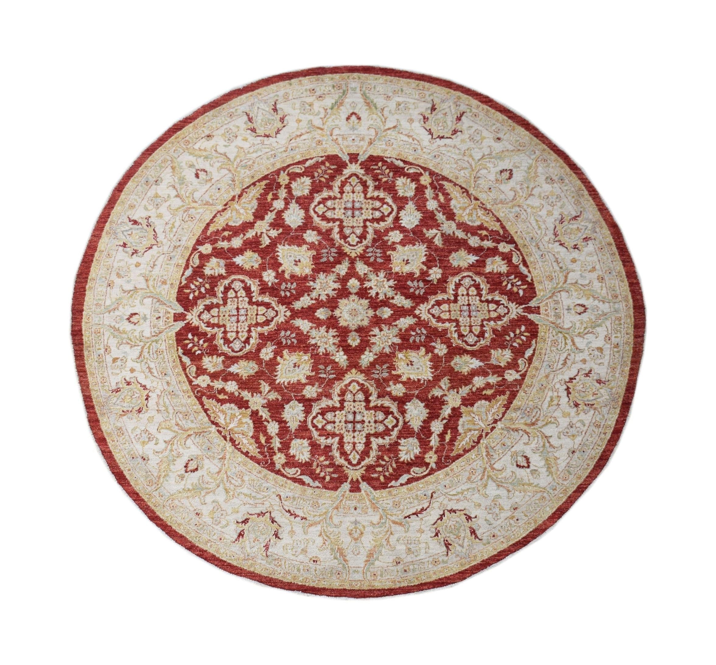 A round Afghan Chobi rug featuring a traditional floral pattern in shades of red and cream.