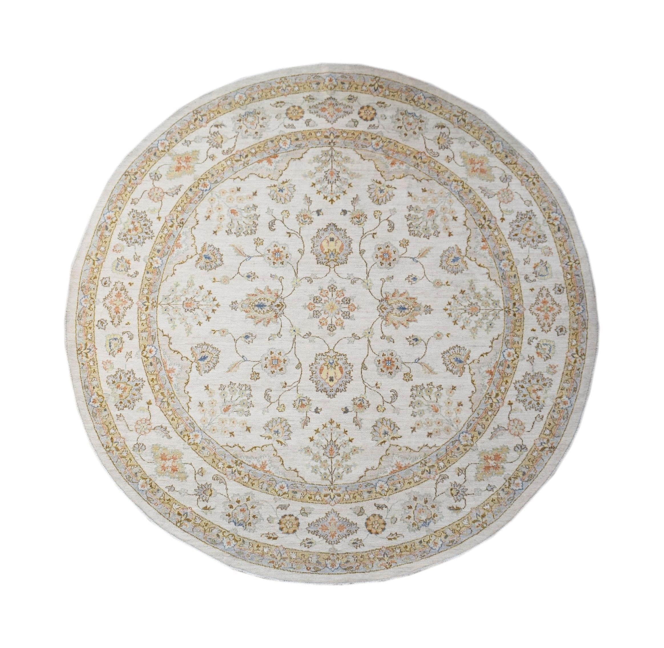 A round, handwoven Afghan Chobi rug featuring a traditional floral pattern in soft, earthy tones.