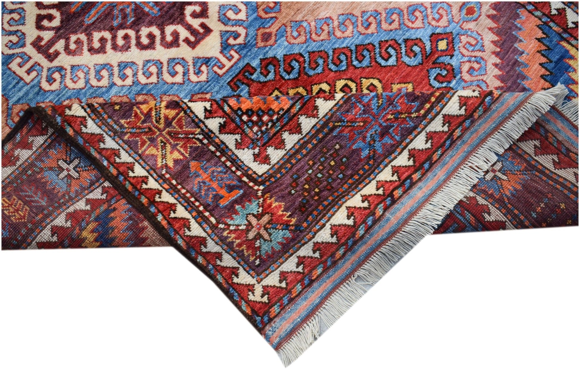 A handwoven Afghan Herati rug featuring intricate geometric patterns in vibrant wool colors.