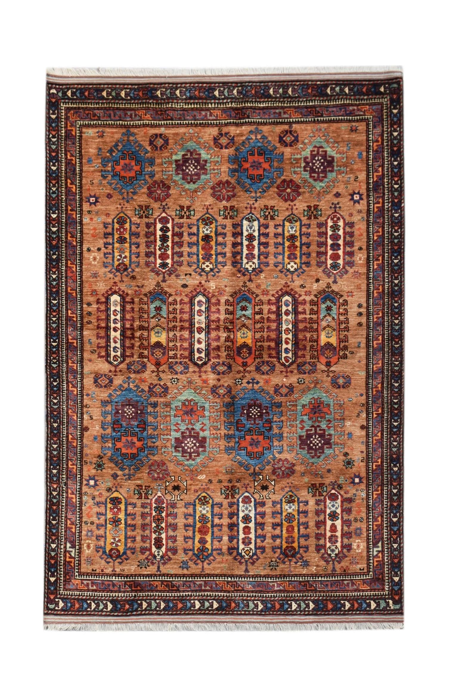 Handwoven Afghan Herati rug featuring a traditional geometric pattern in warm earthy tones.