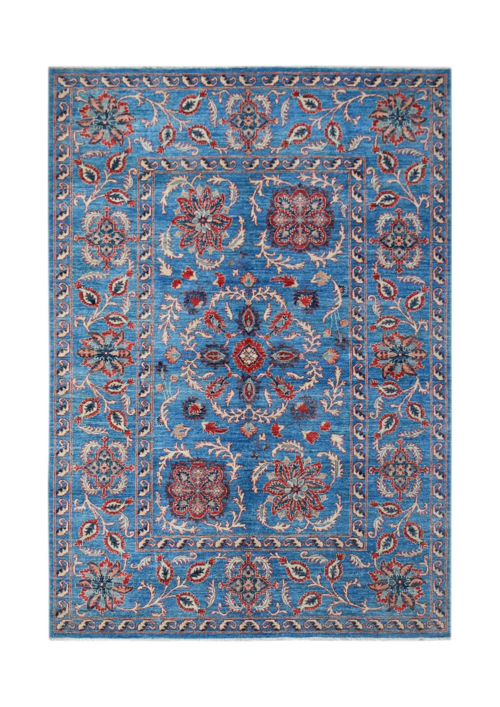 Handwoven Afghan Chobi rug featuring a blue field with traditional red and cream floral motifs.