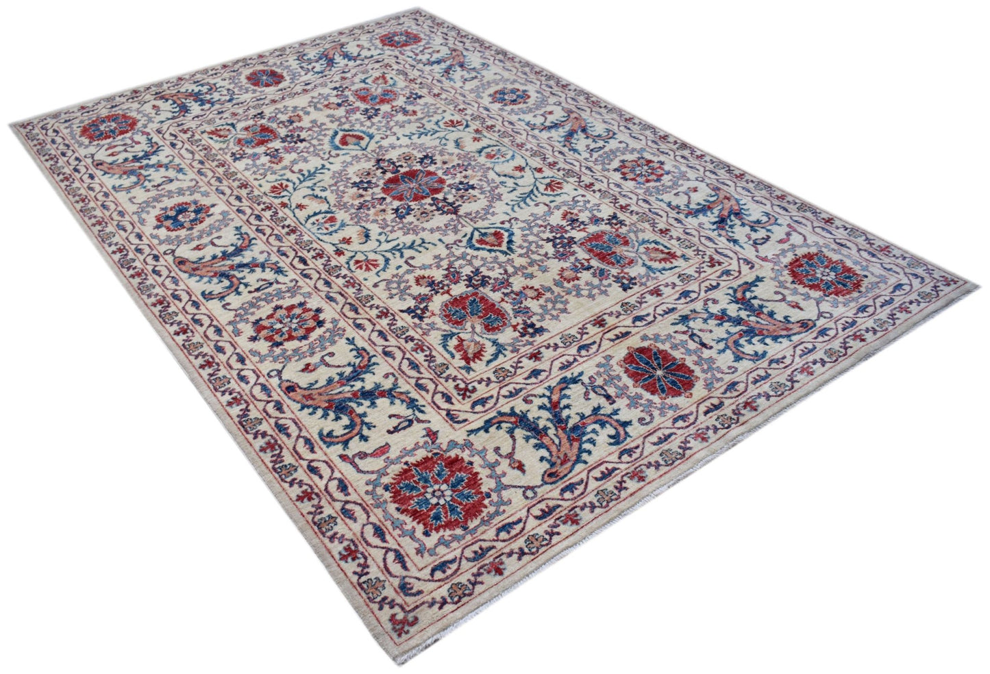 Handmade Afghan Chobi rug featuring a traditional Suzani floral pattern in red and blue on cream.