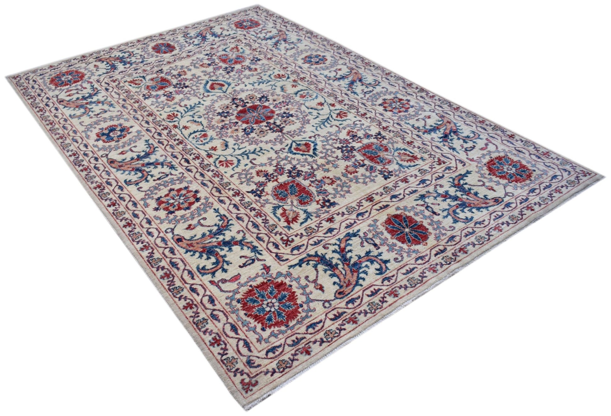 Handmade Afghan Chobi rug featuring a traditional Suzani floral pattern in red and blue on cream.