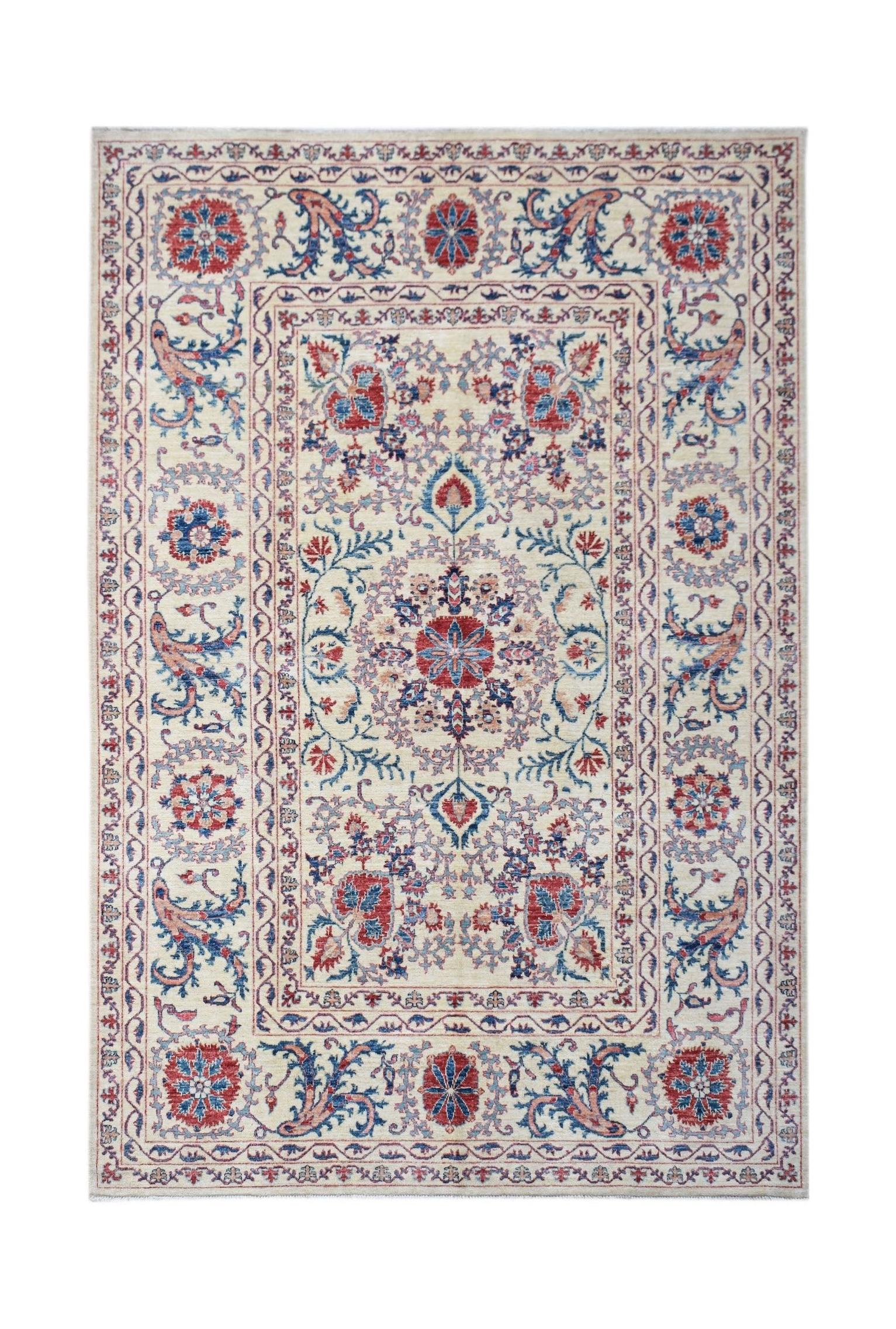 Handmade Afghan Chobi rug featuring a traditional Suzani floral pattern in red and blue on cream.
