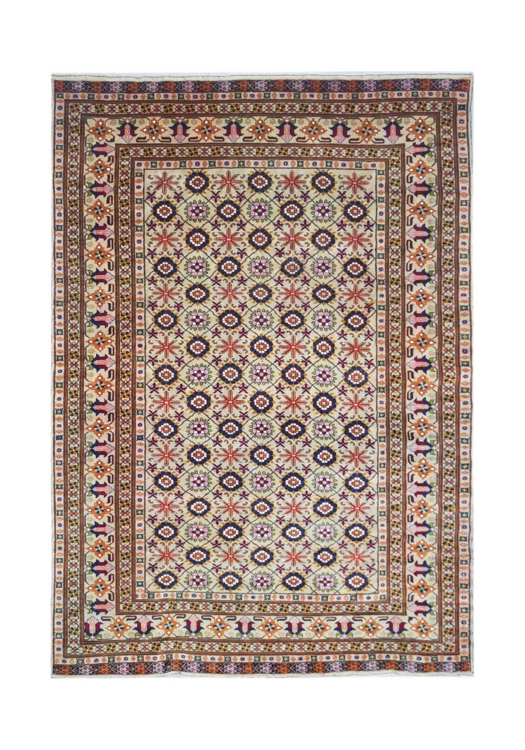 A hand-knotted Afghan Bashiri rug featuring a geometric pattern in silk and wool.