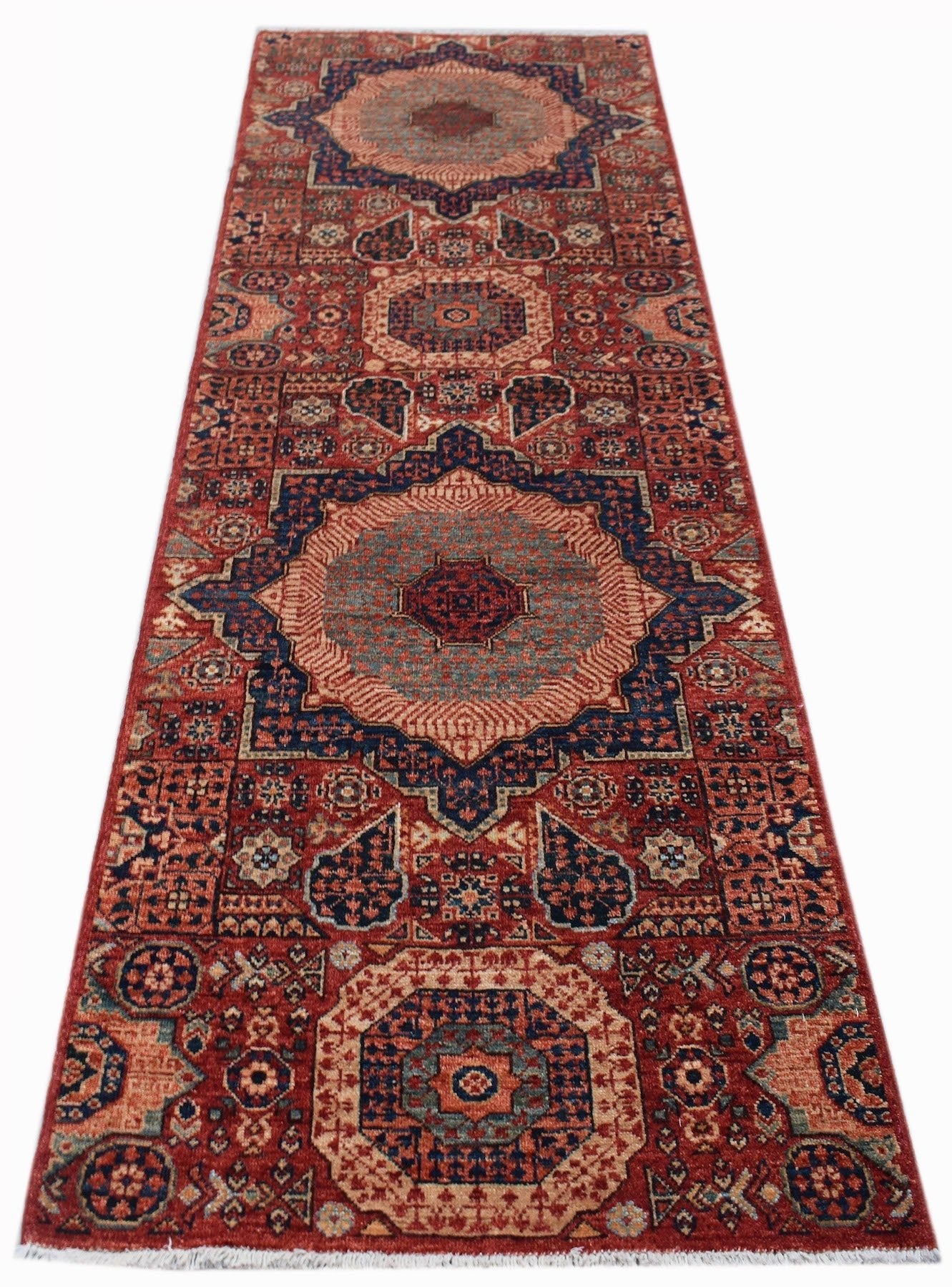 Handwoven Afghan Chobi runner featuring a traditional Mamluk medallion pattern in red and blue.