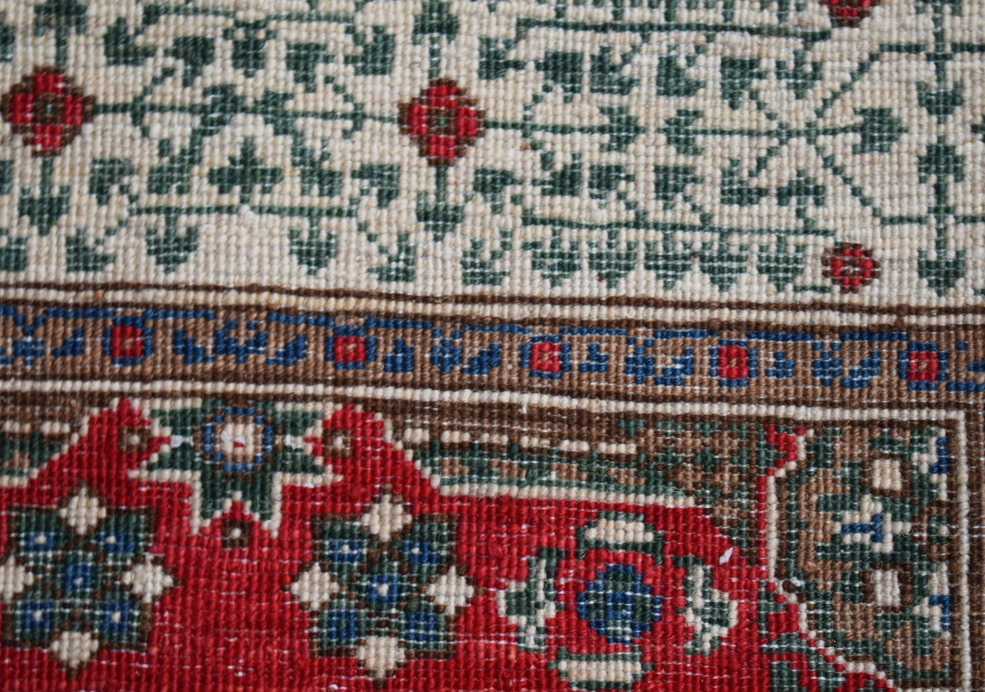 A close-up of a handwoven Afghan Chobi runner featuring a traditional Mamluk geometric pattern.