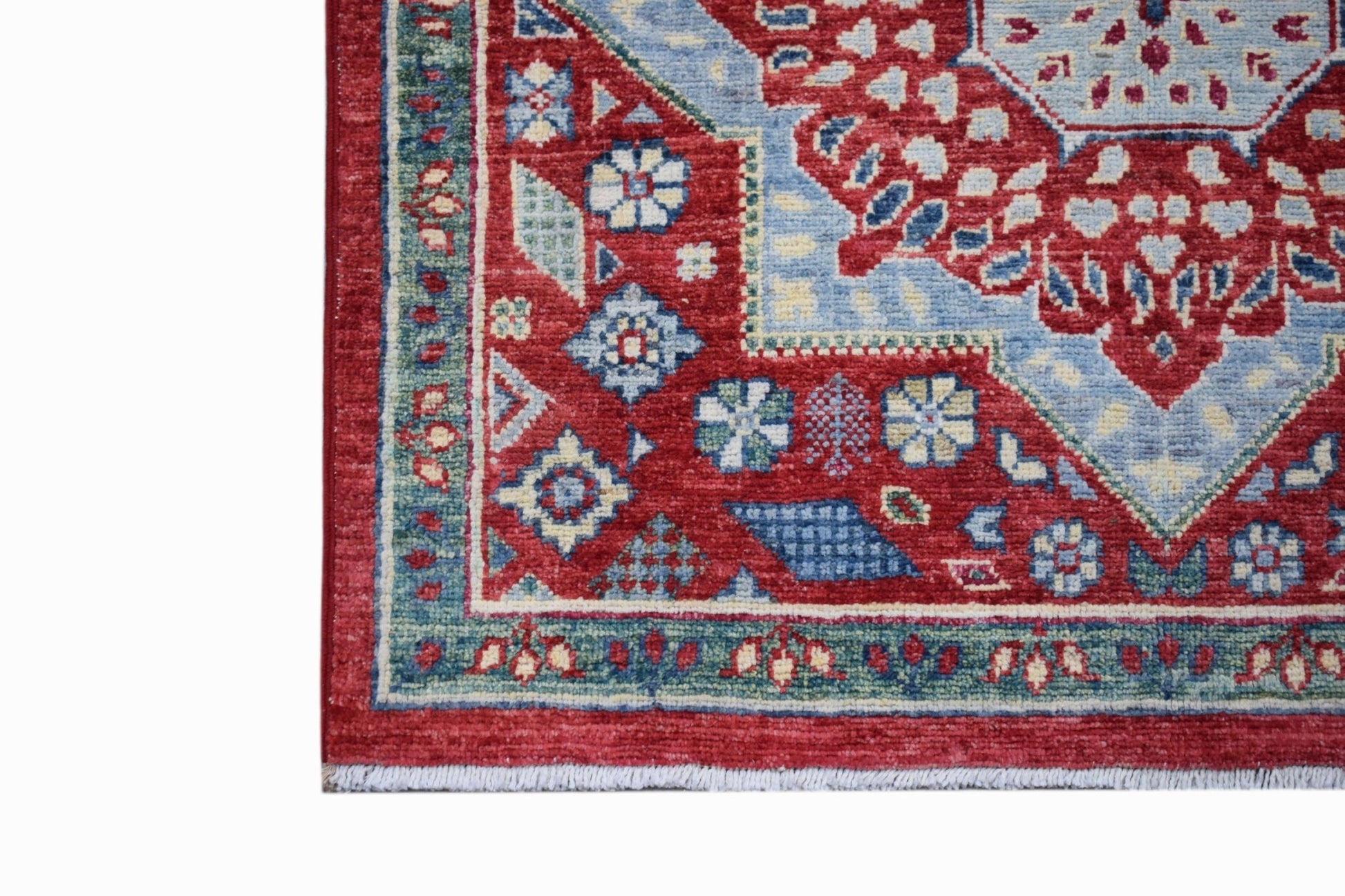 A handmade Afghan Chobi runner featuring a traditional red and blue Mamluk medallion pattern.