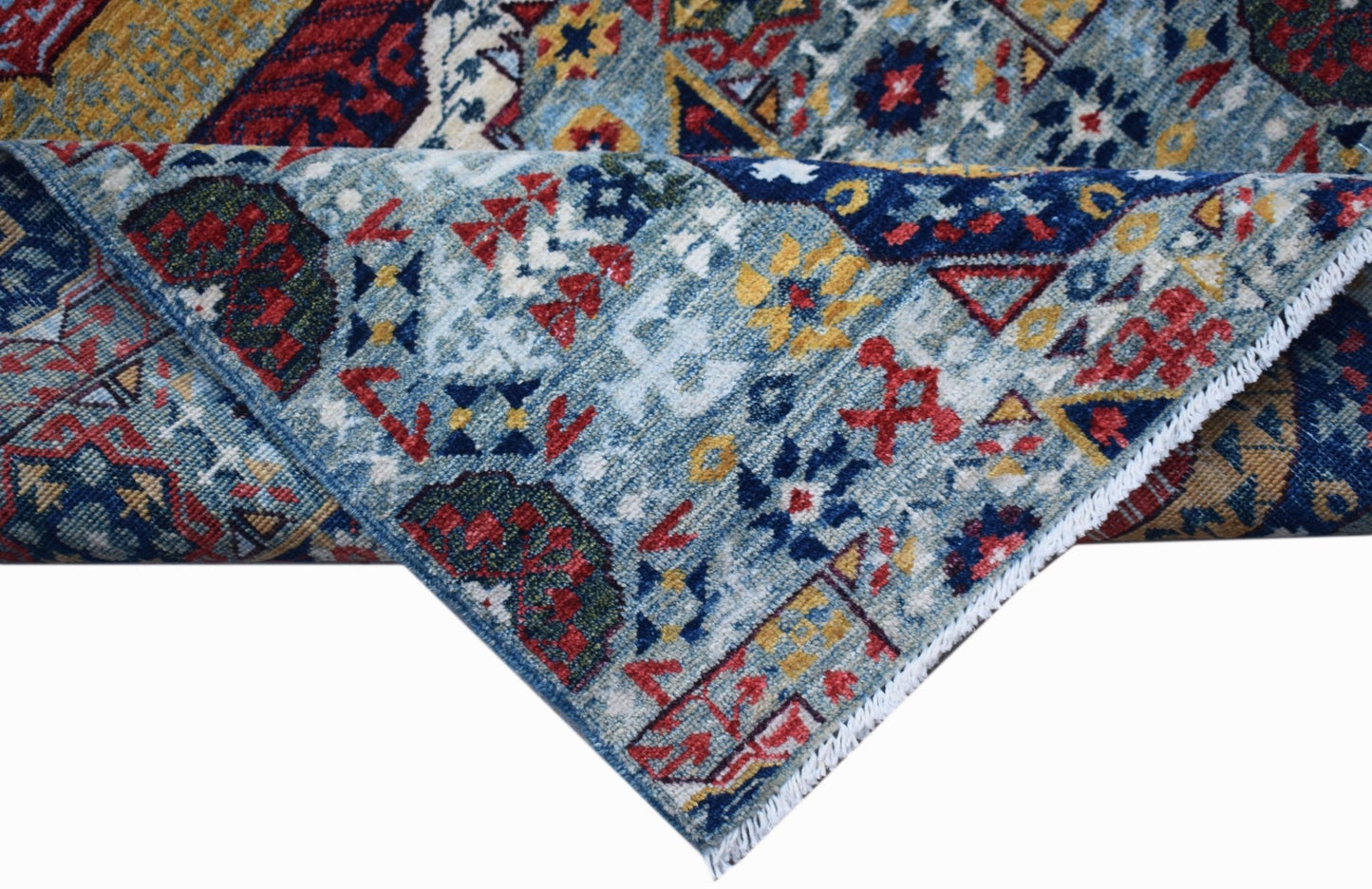 A handwoven Afghan Chobi runner featuring a traditional blue Mamluk pattern with intricate details.