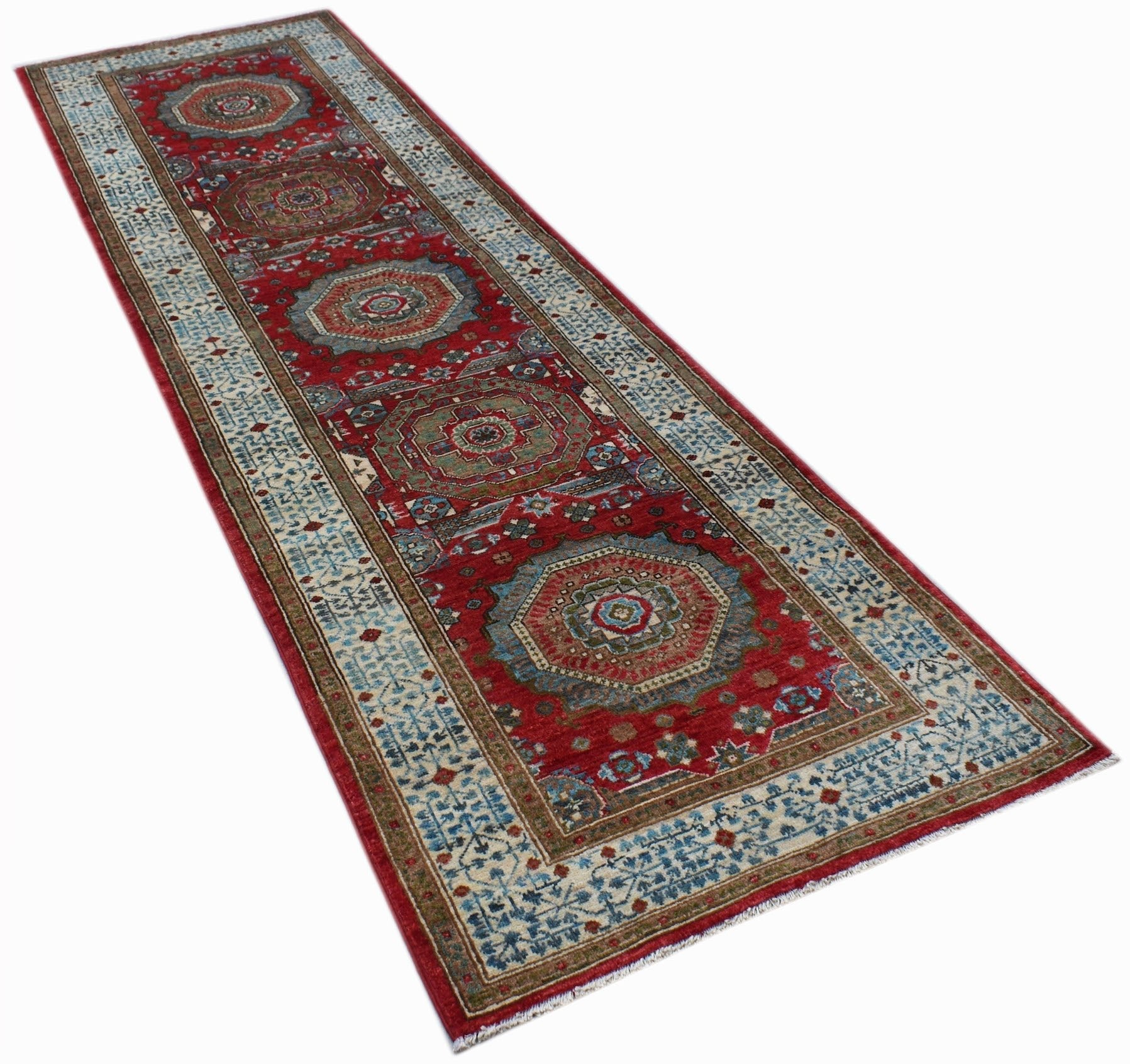 A handmade Afghan Chobi runner featuring a red field with intricate Mamluk medallion patterns.