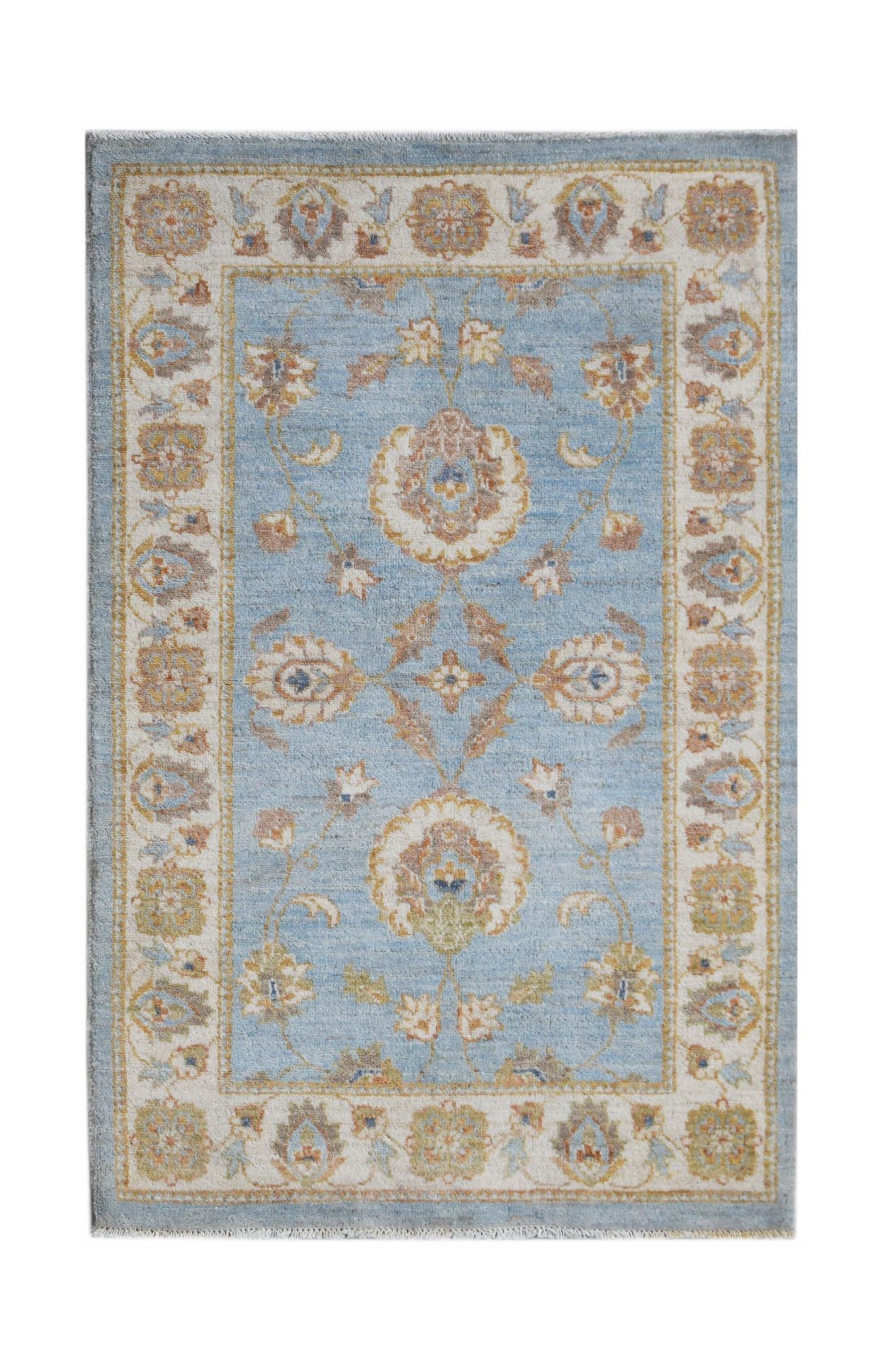 A rectangular Afghan Chobi rug featuring a light blue field with traditional floral motifs.