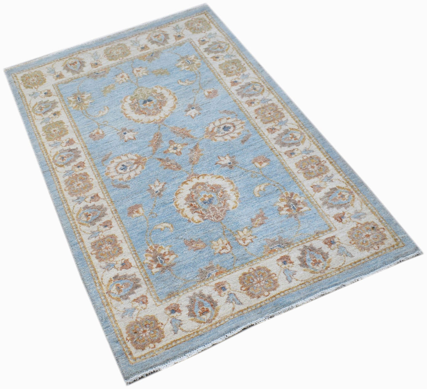 A rectangular Afghan Chobi rug featuring a light blue field with traditional floral patterns.