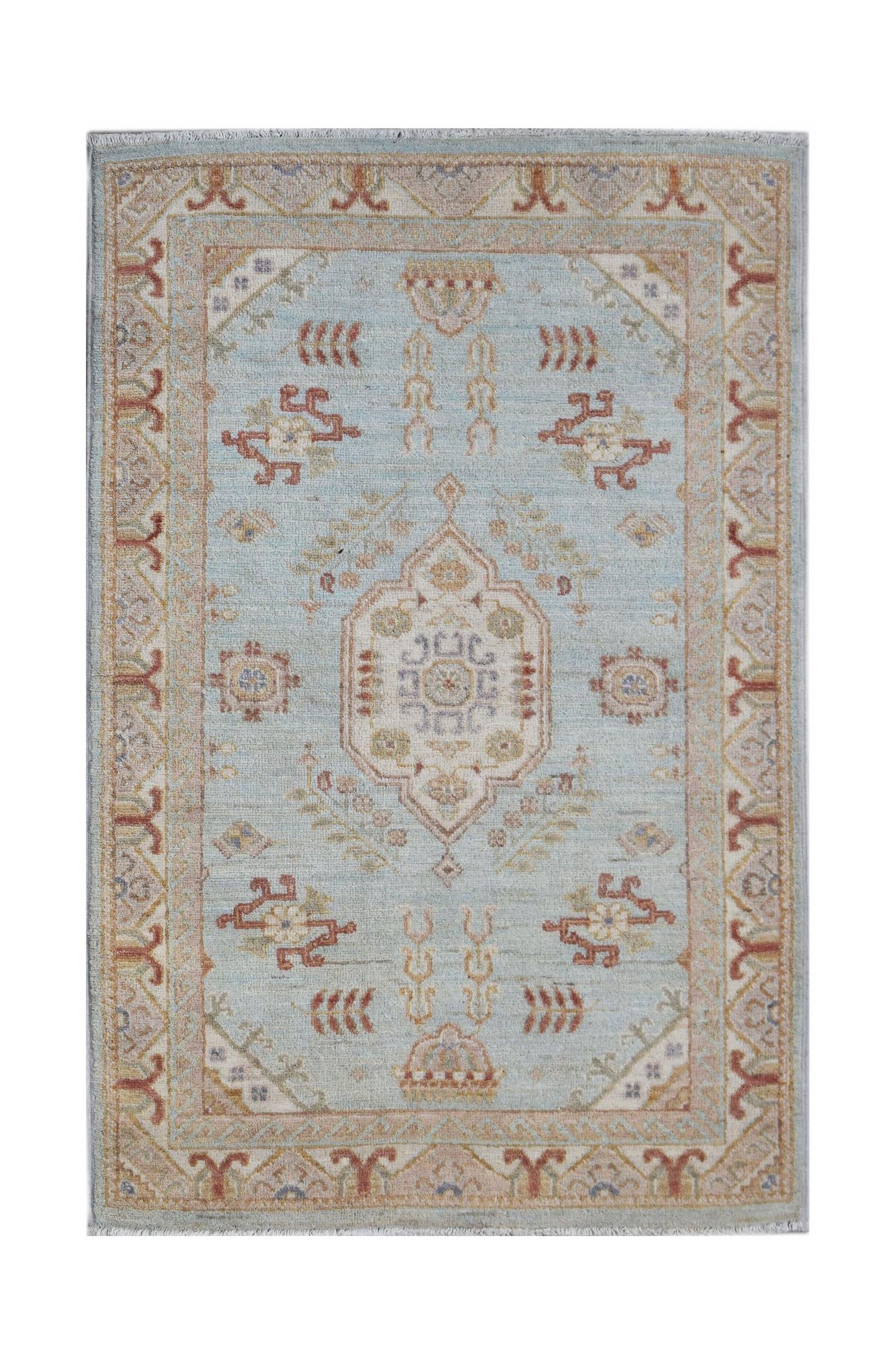 A rectangular Afghan Chobi rug featuring a central medallion on a light blue field.