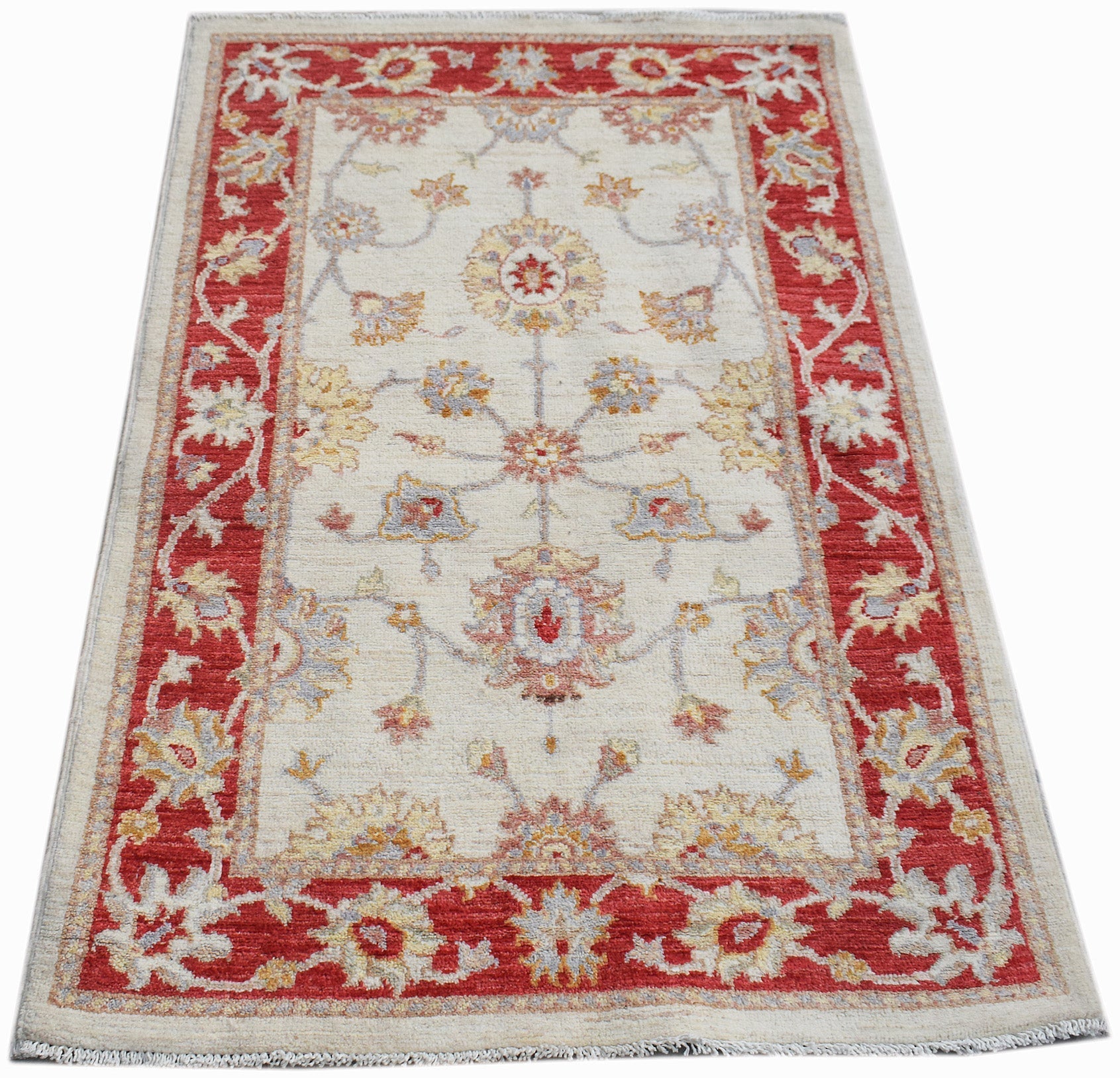 A rectangular Afghan Chobi rug featuring a traditional floral pattern in red, cream, and gold.