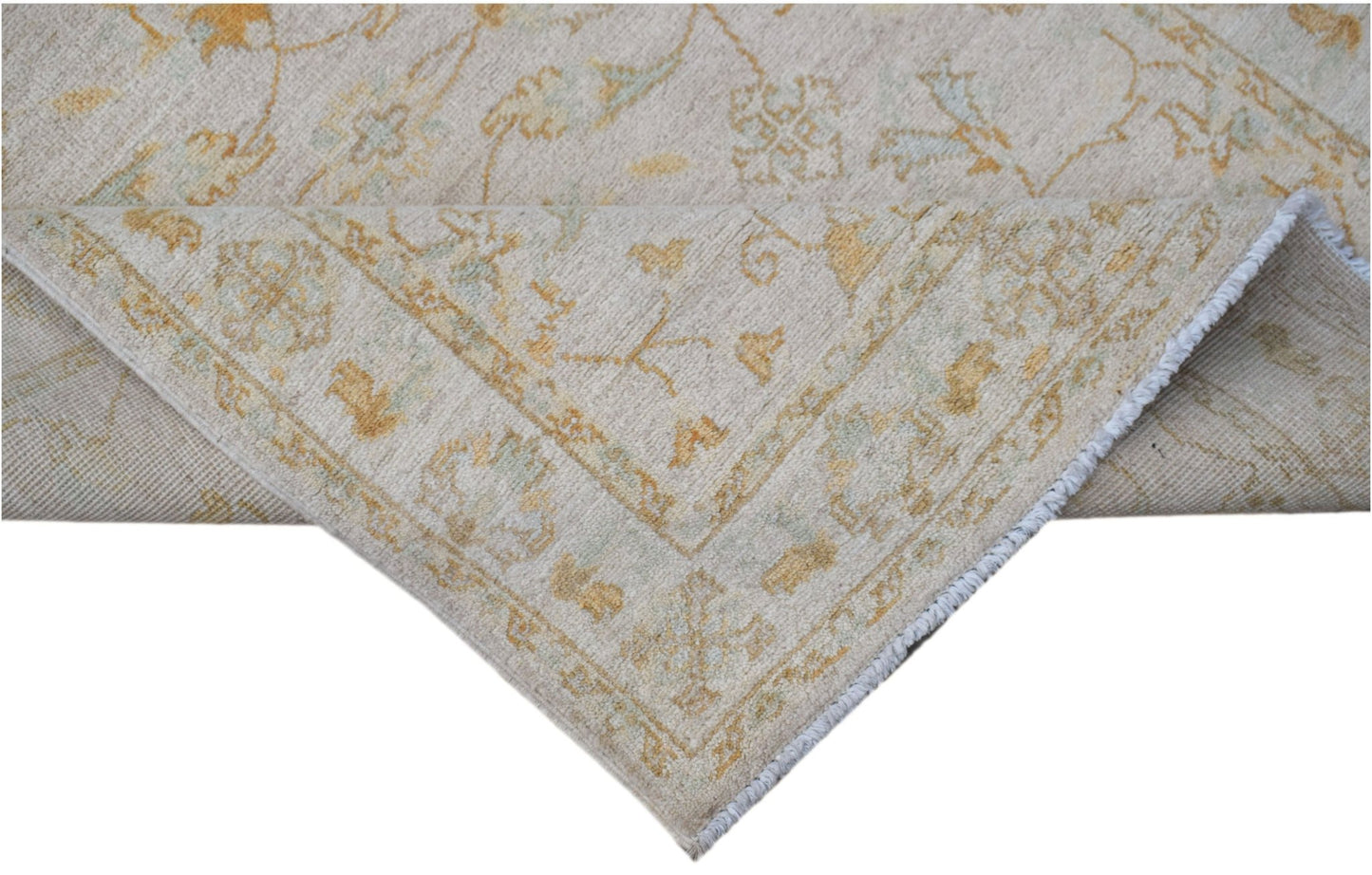 A handwoven Afghan Chobi rug featuring a traditional floral pattern in soft beige and gold tones.