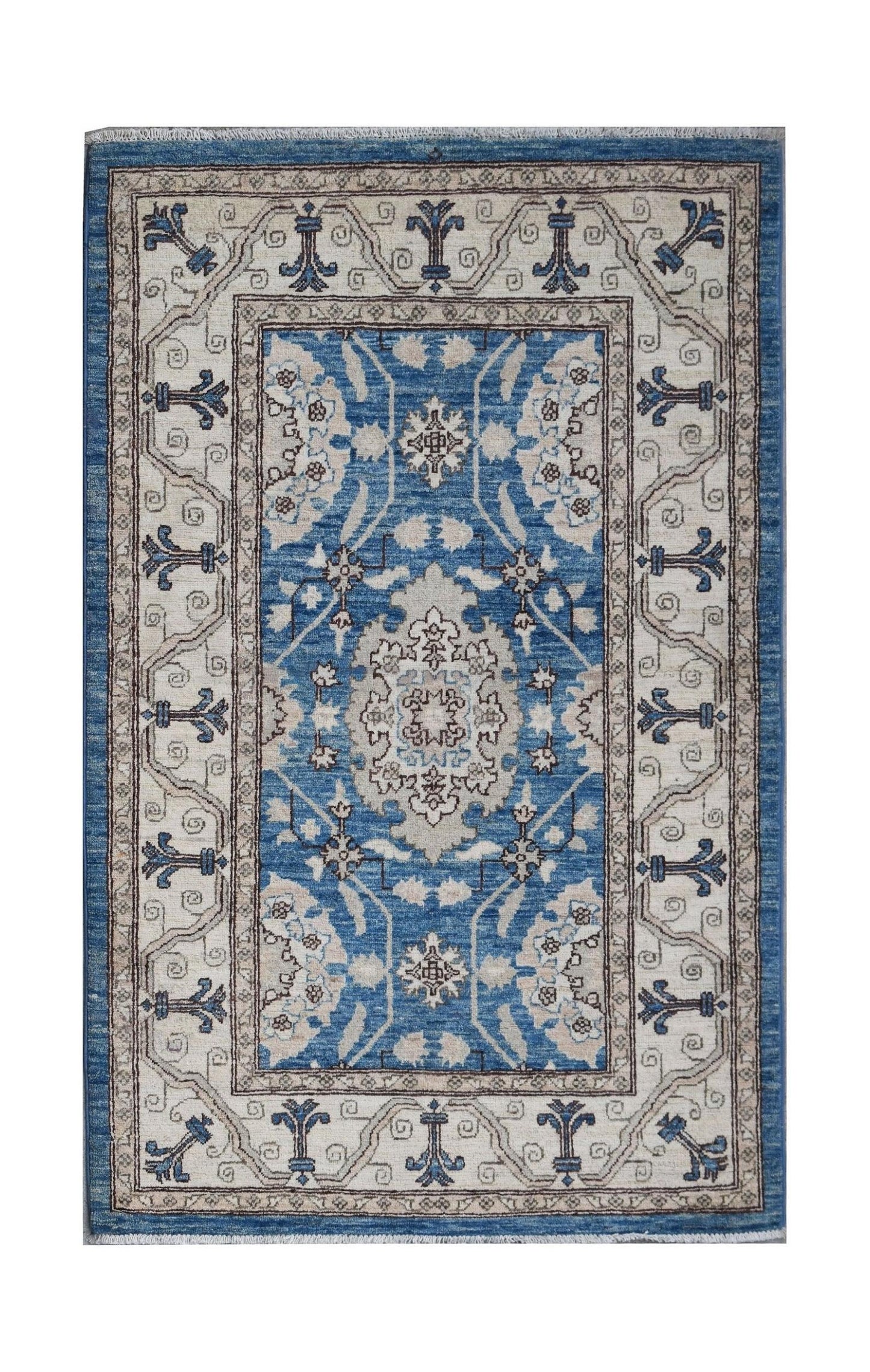 A rectangular Afghan Chobi rug featuring a blue central medallion and floral patterns on cream.