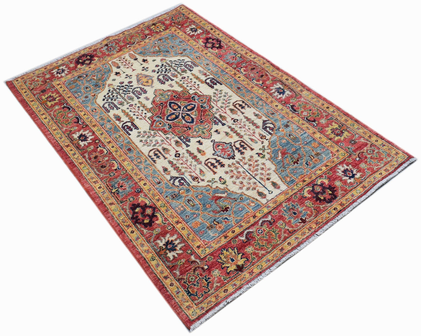 Handwoven Afghan Chobi rug featuring a traditional Heriz pattern in red, blue, and cream tones.