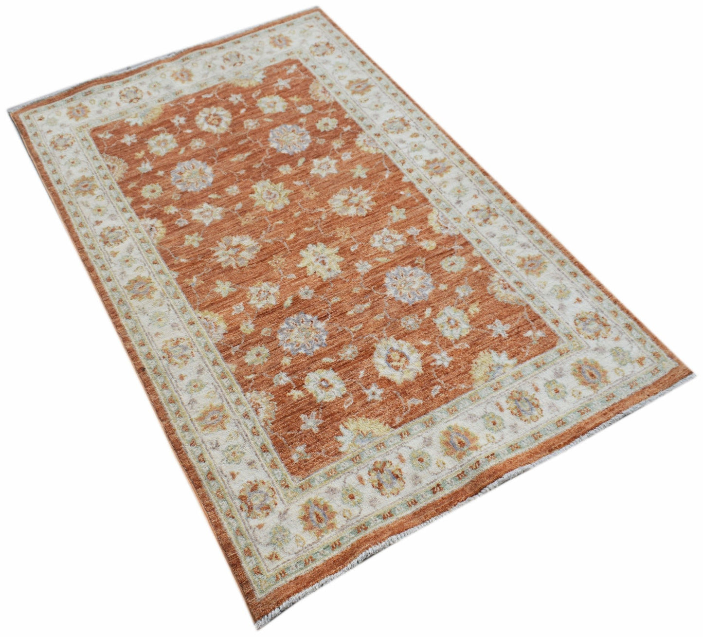 A rectangular Afghan Chobi rug featuring a floral pattern in shades of orange, cream, and blue.