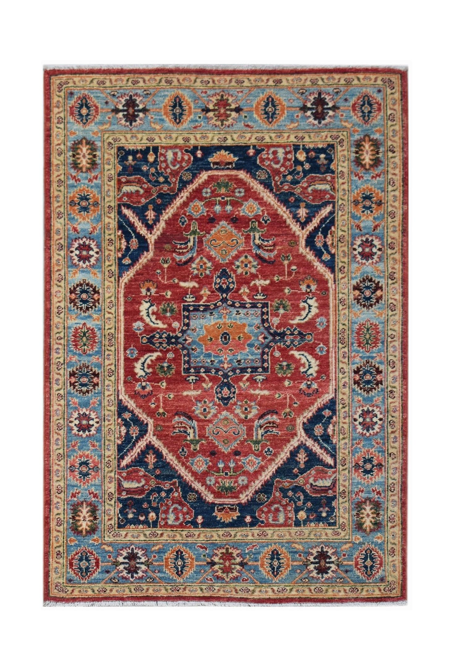 Handwoven Afghan Chobi rug featuring a traditional Heriz pattern in red, blue, and orange tones.