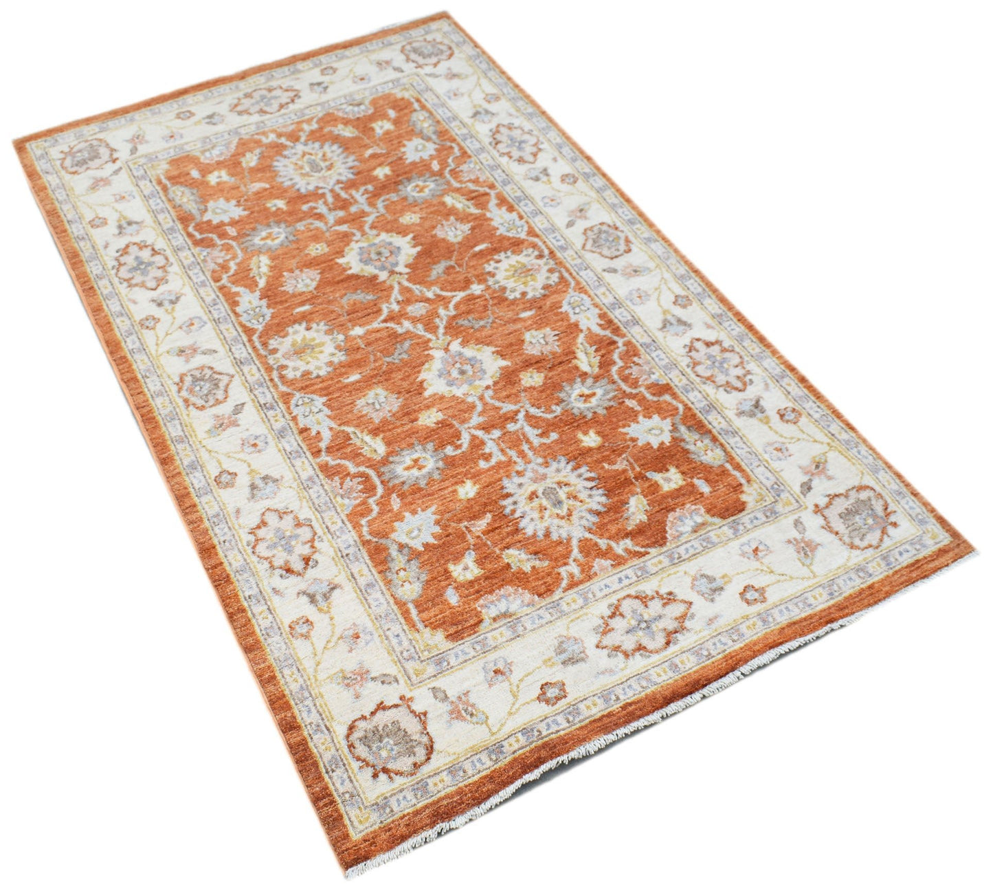 A rectangular Afghan Chobi rug featuring a floral pattern in orange, cream, and grey tones.