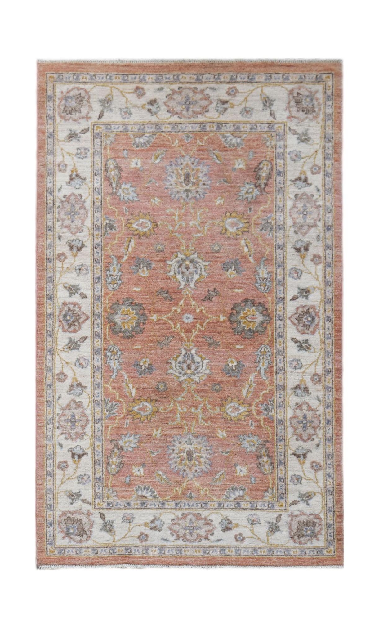 A rectangular Afghan Chobi rug featuring a traditional floral pattern in muted terracotta and cream.