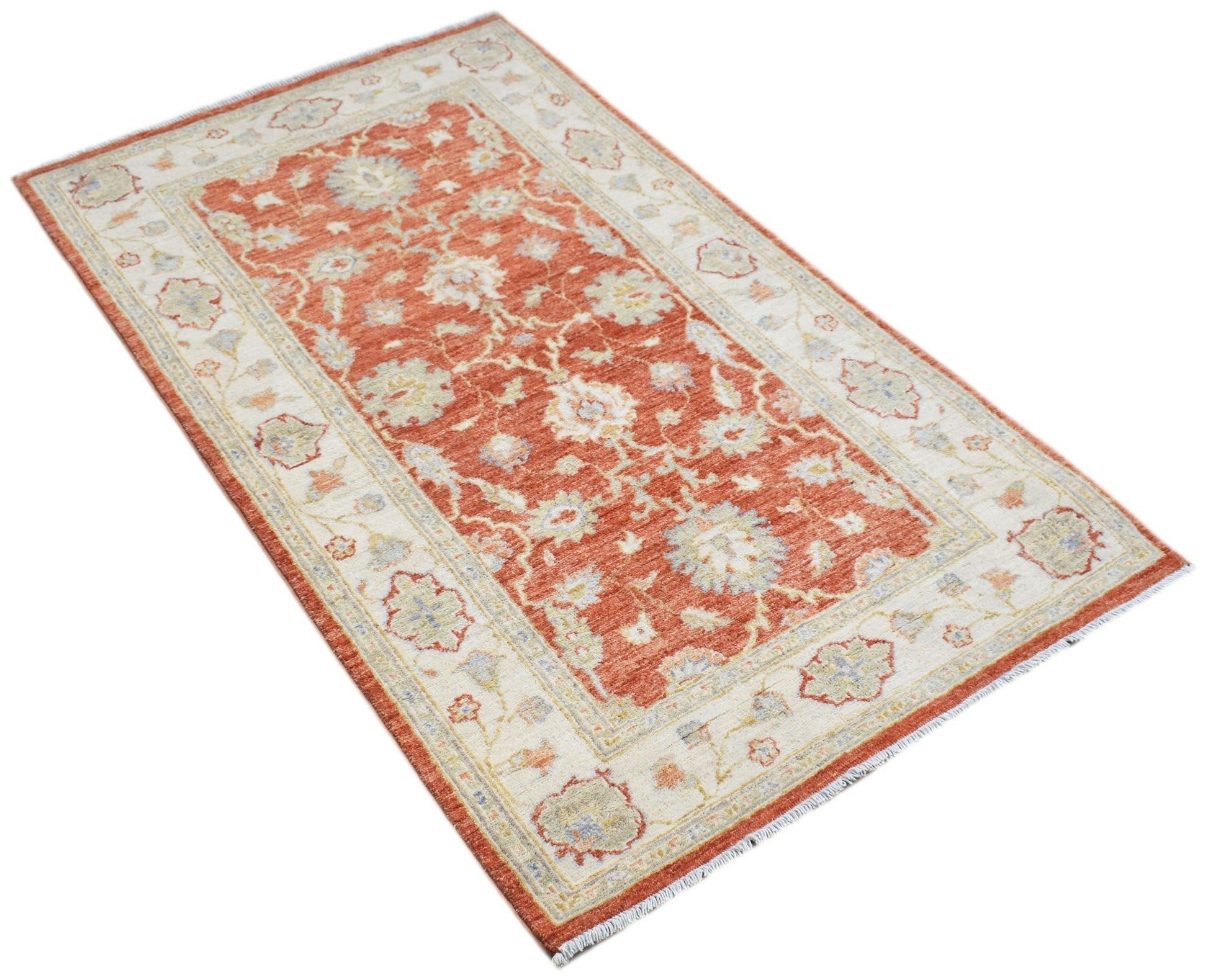 A rectangular Afghan Chobi rug featuring a traditional floral pattern in rust and cream tones.