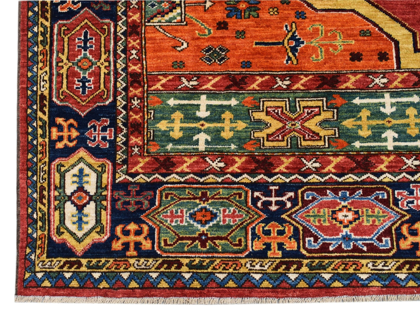 A handmade Afghan Chobi rug featuring intricate geometric patterns in vibrant red, blue, and green.