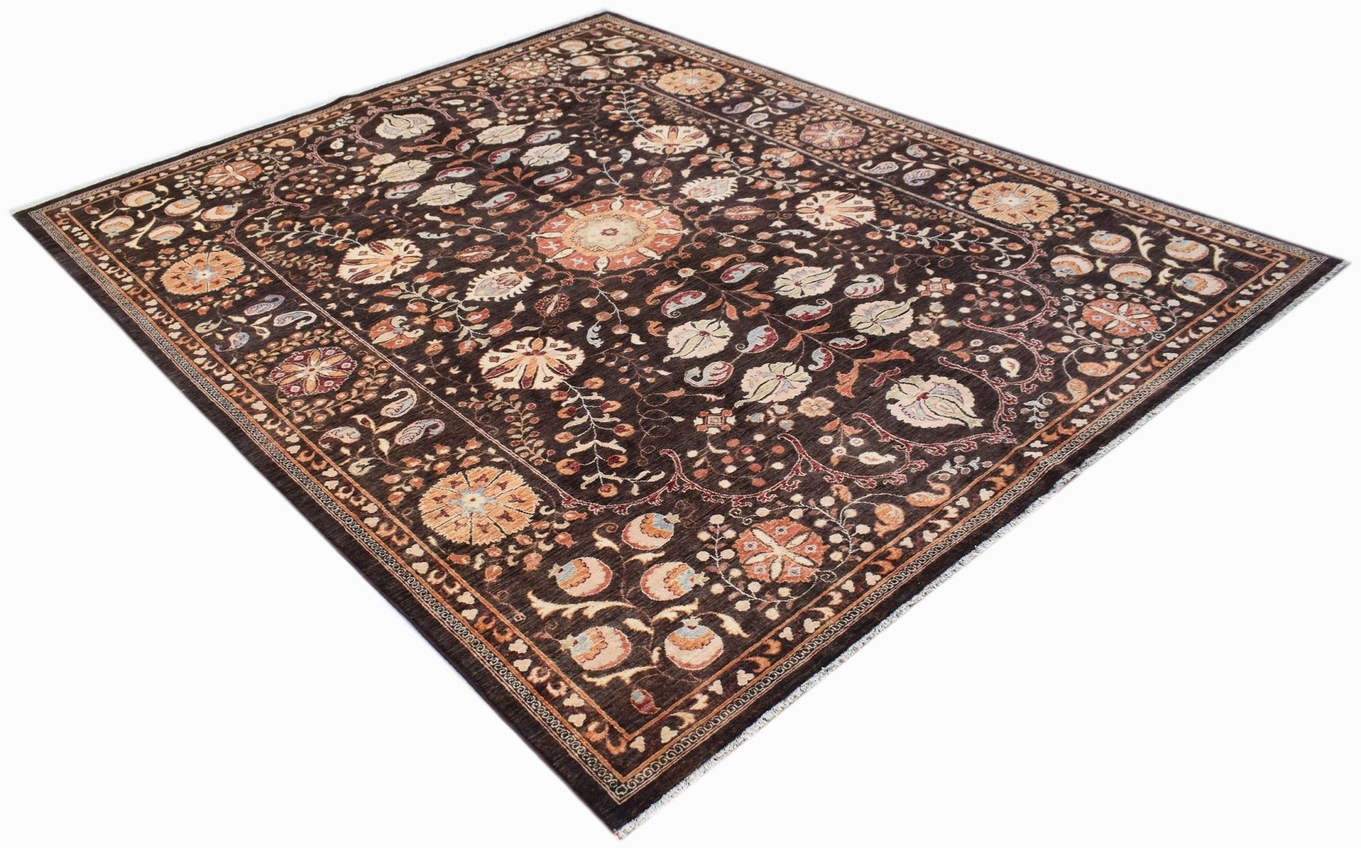 A rectangular Afghan Chobi rug featuring a dark brown field with intricate floral Suzani patterns.