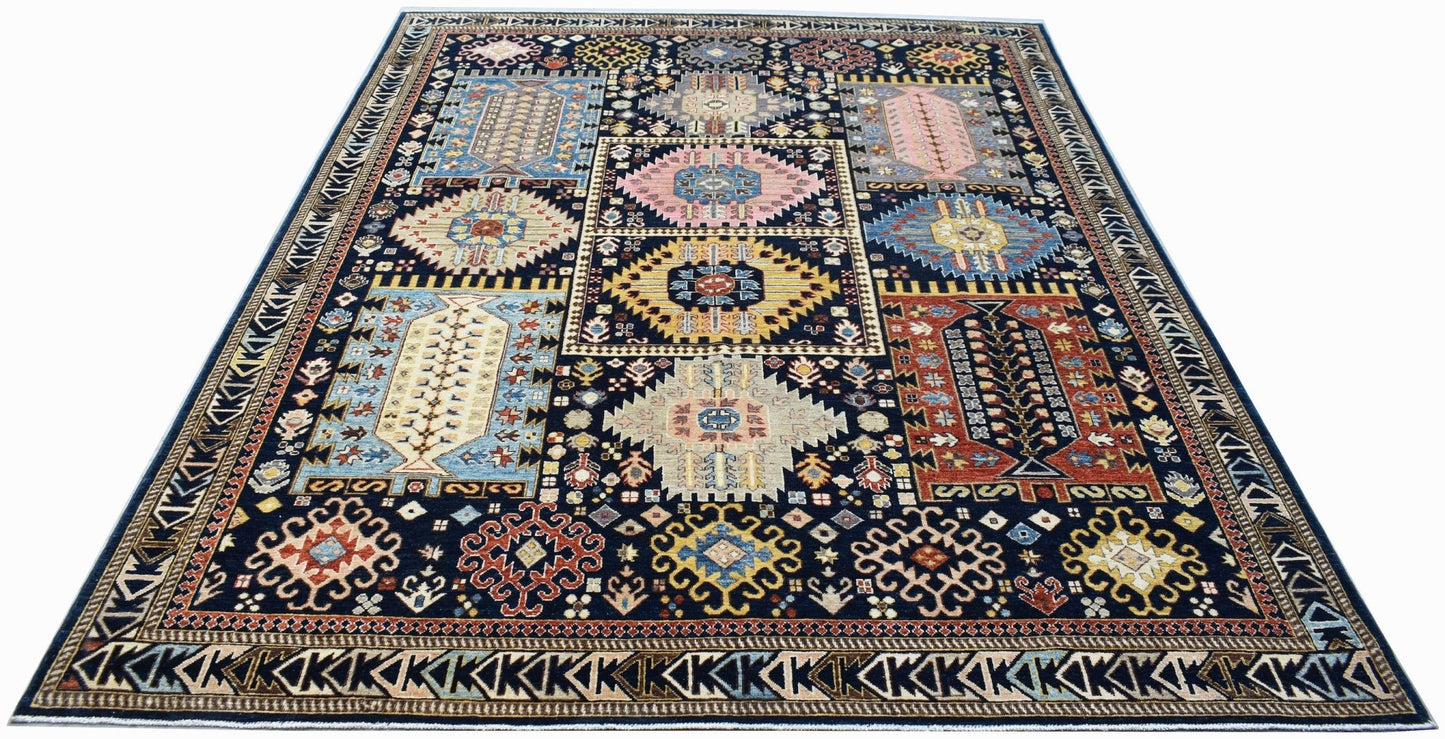 A rectangular Afghan Chobi rug featuring a dark blue field with colorful geometric medallions.