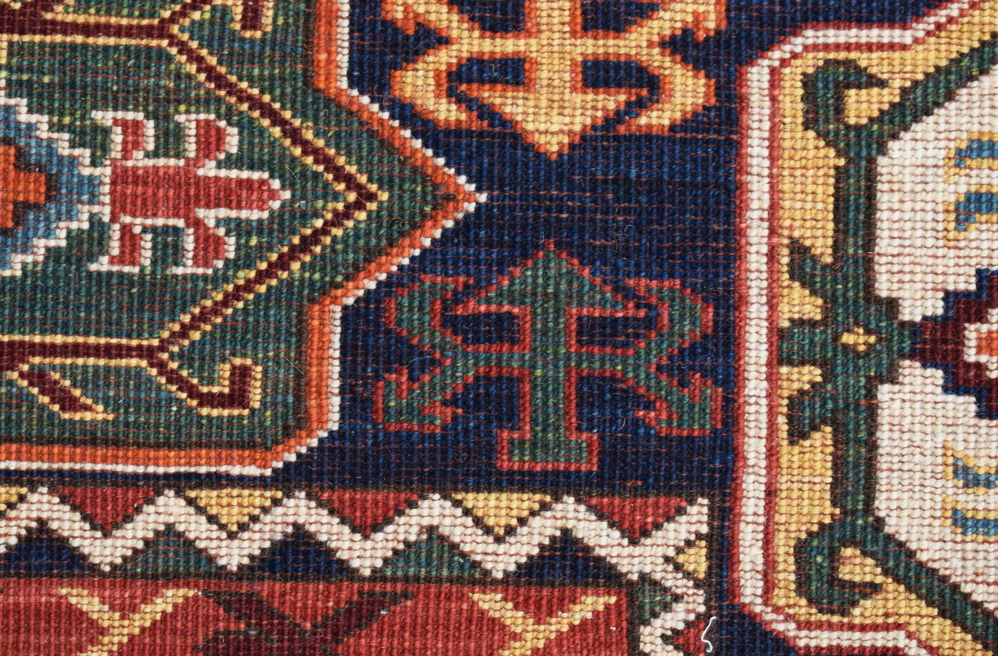 A close-up of a handwoven Afghan Chobi rug featuring intricate geometric patterns in earthy tones.