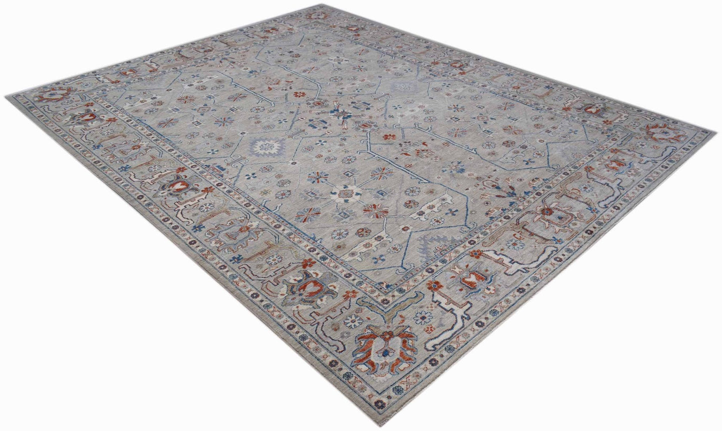 A rectangular Afghan Chobi rug featuring a traditional floral pattern in muted earth tones.