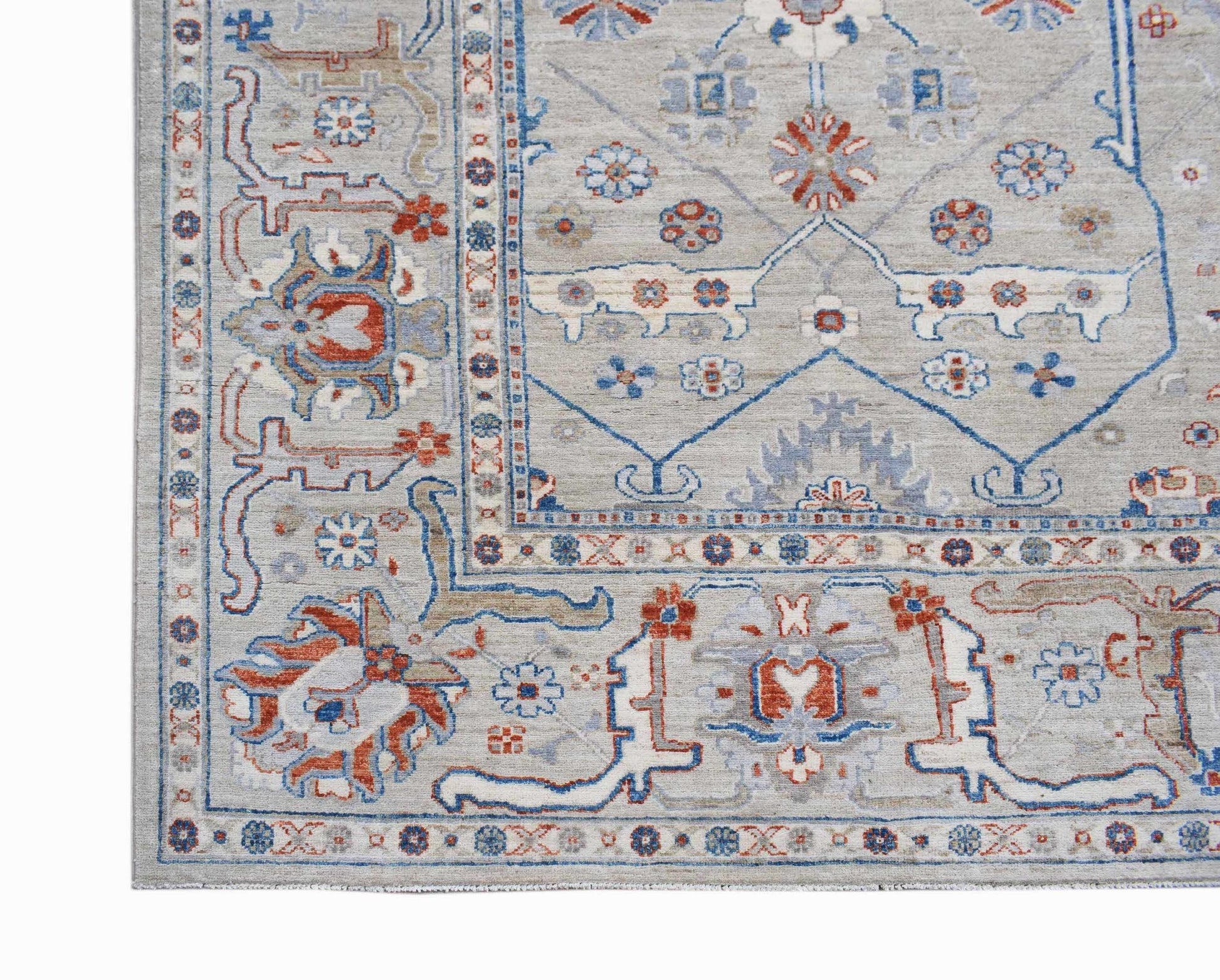 A handwoven Afghan Chobi rug featuring a traditional floral pattern in blue, red, and beige tones.