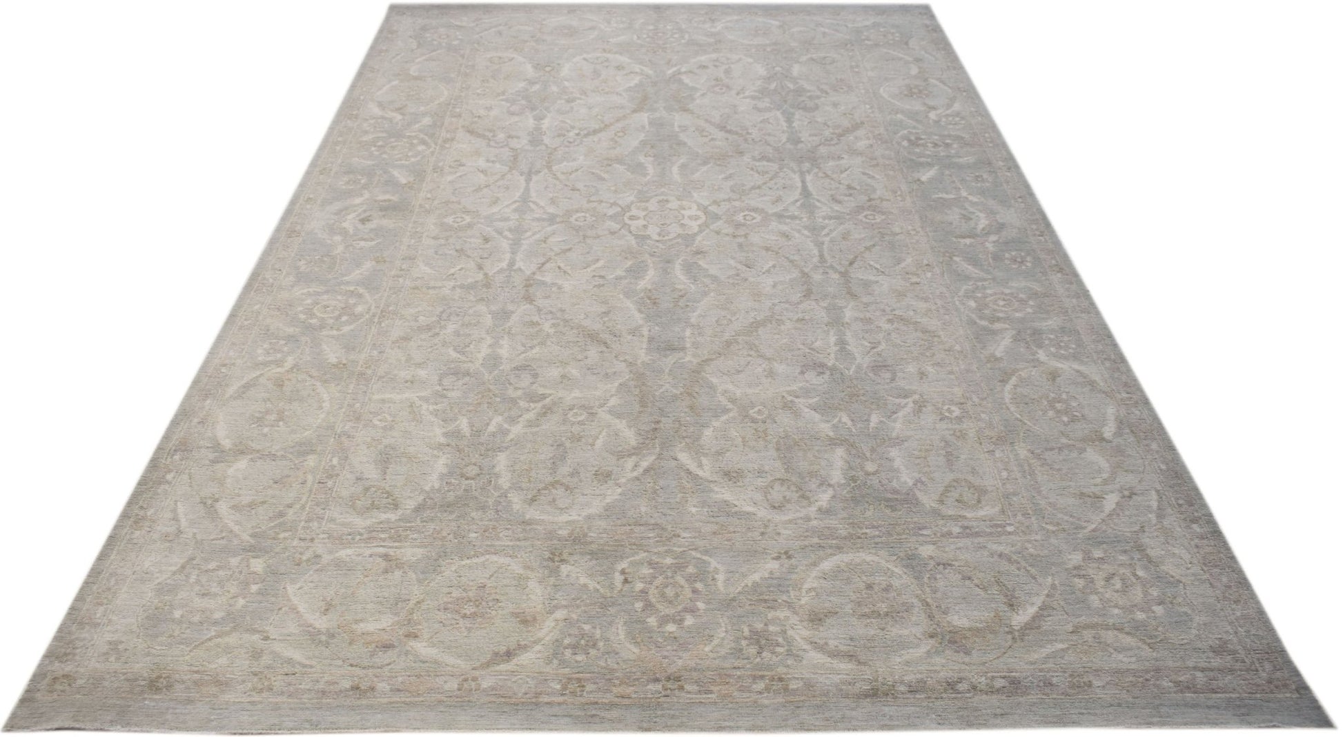 A rectangular Afghan Balkh rug featuring a traditional floral pattern in soft, neutral tones.