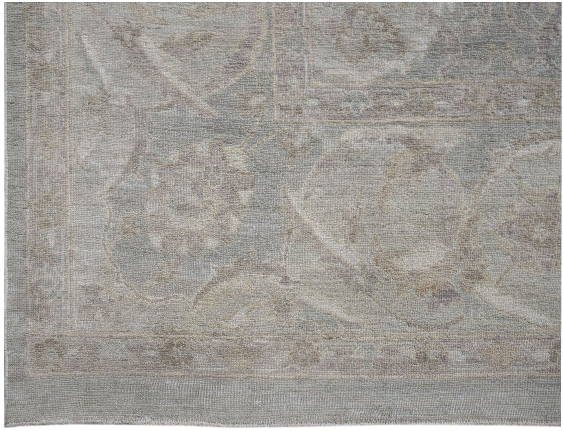 A handwoven Afghan Balkh rug featuring a traditional Chobi pattern in soft, neutral earth tones.