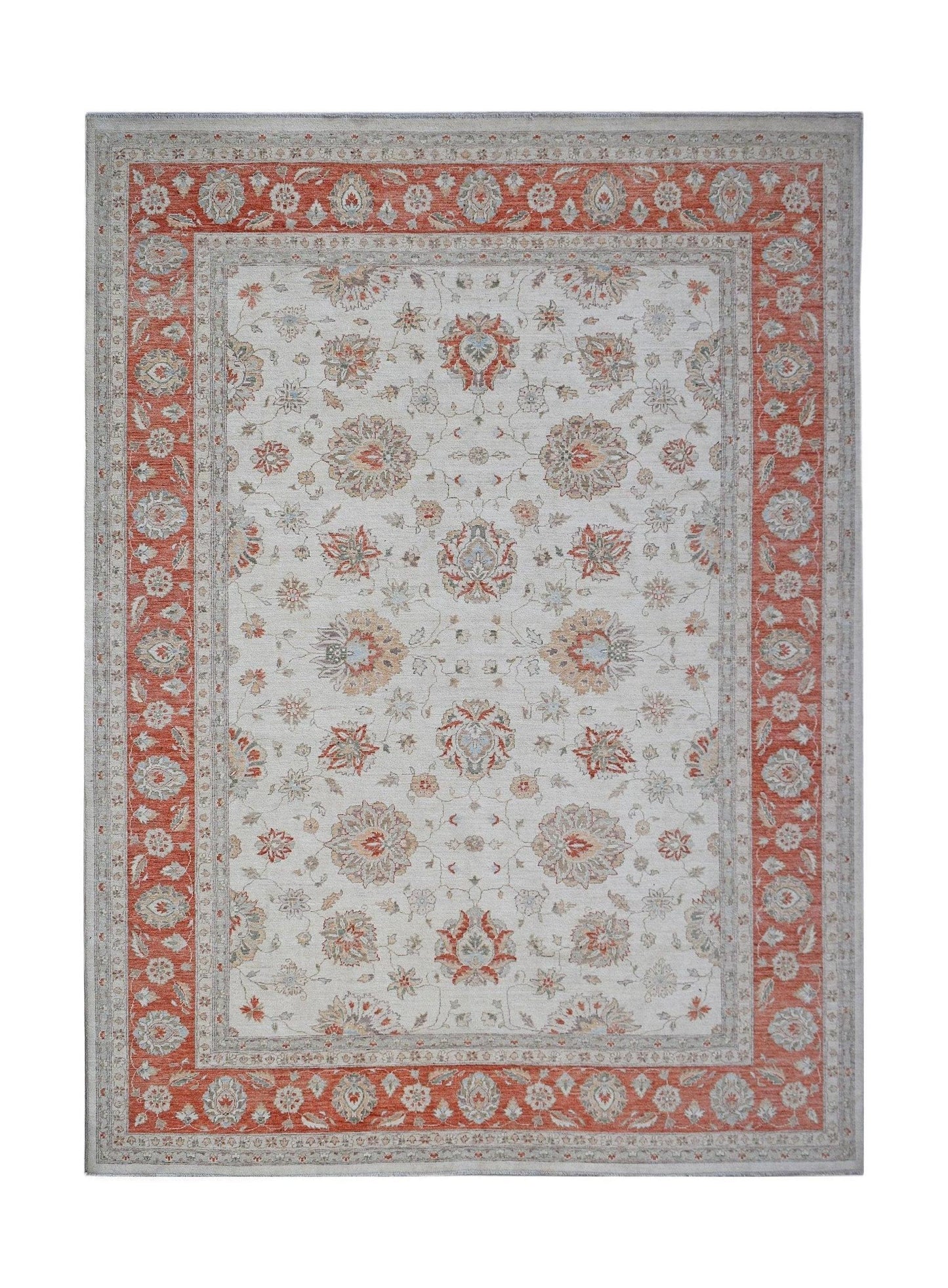An Afghan Chobi rug featuring a traditional floral pattern in rust and cream tones.